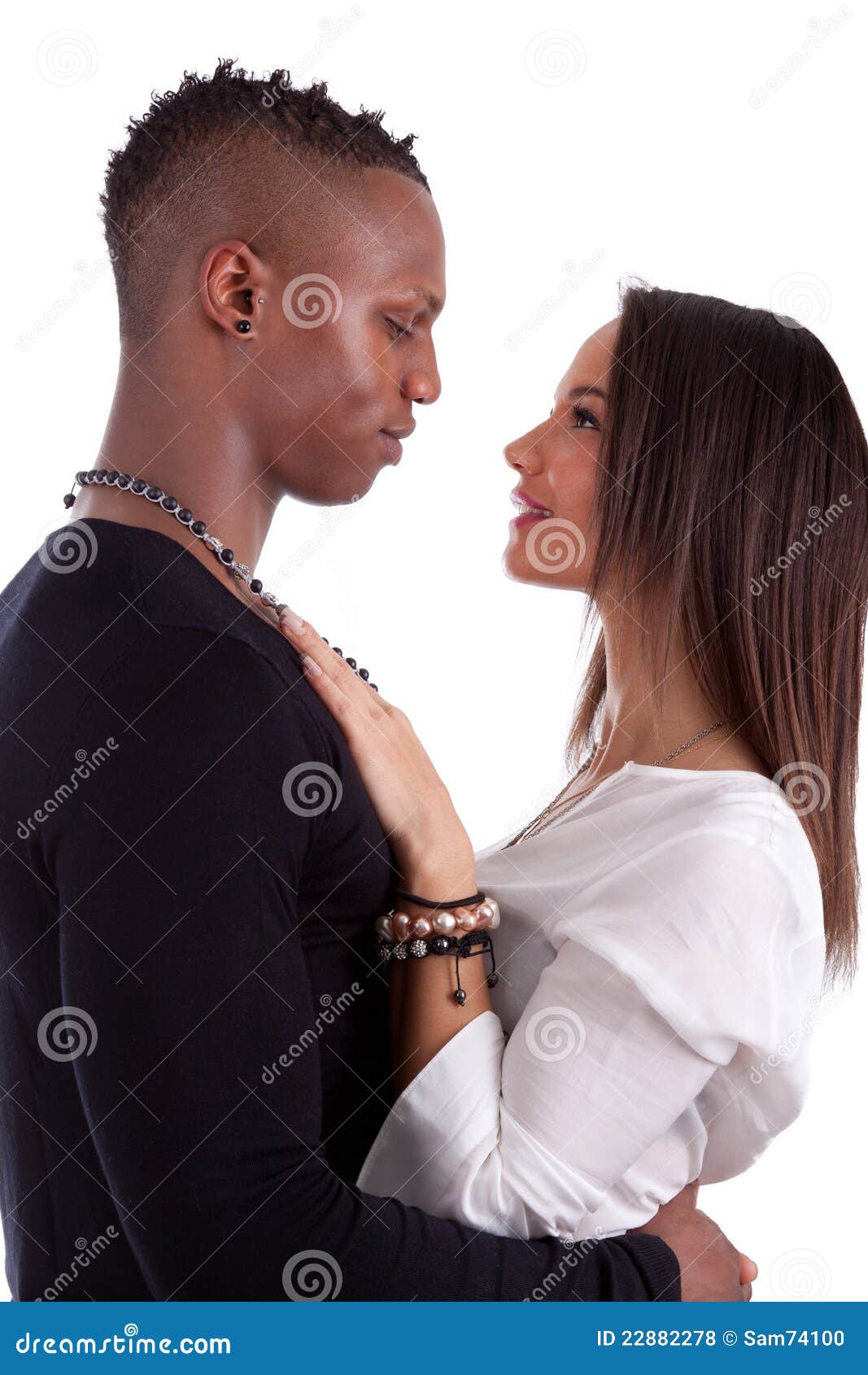 Young Mixed Couple Looking at Each Other Stock Photo - Image of looking ...