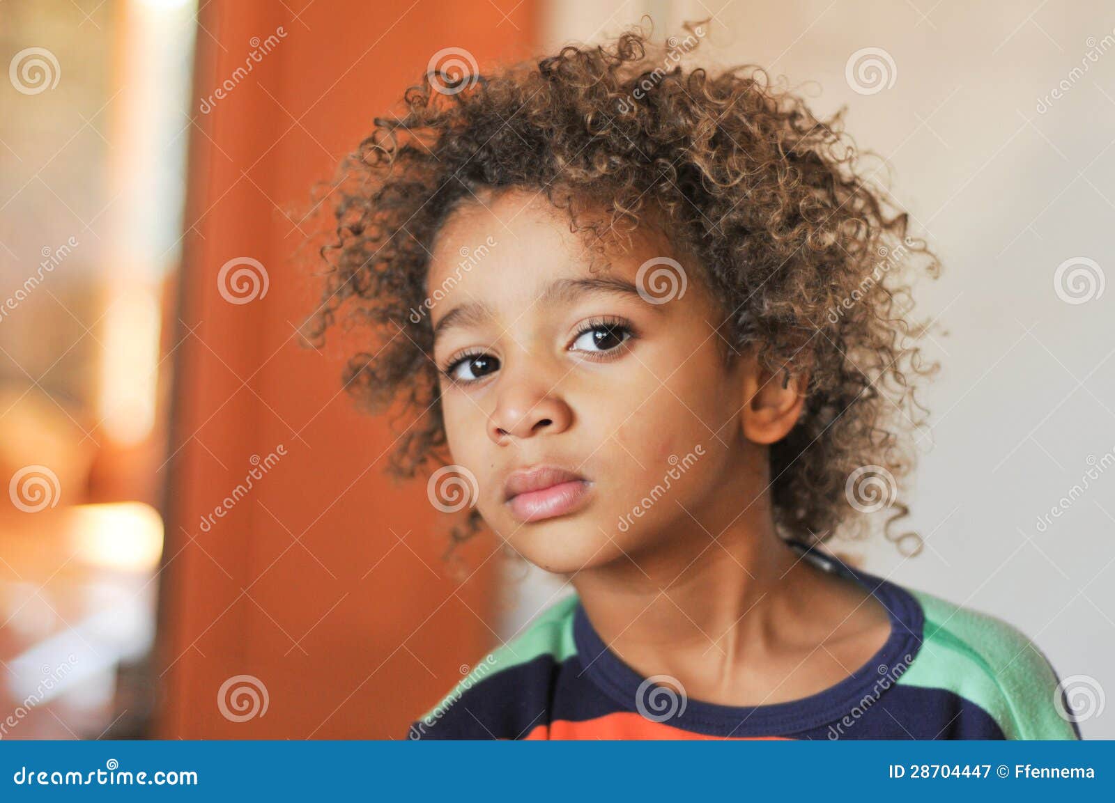 young mixed race boy with curly hair stock image - image of