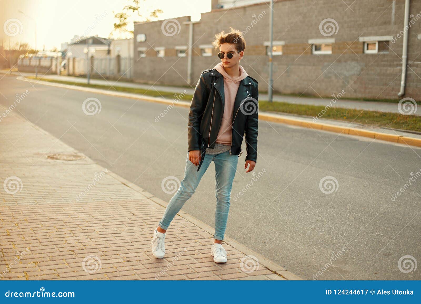 Young Model Guy in a Black Leather Jacket, a Pink Sweatshirt Stock ...