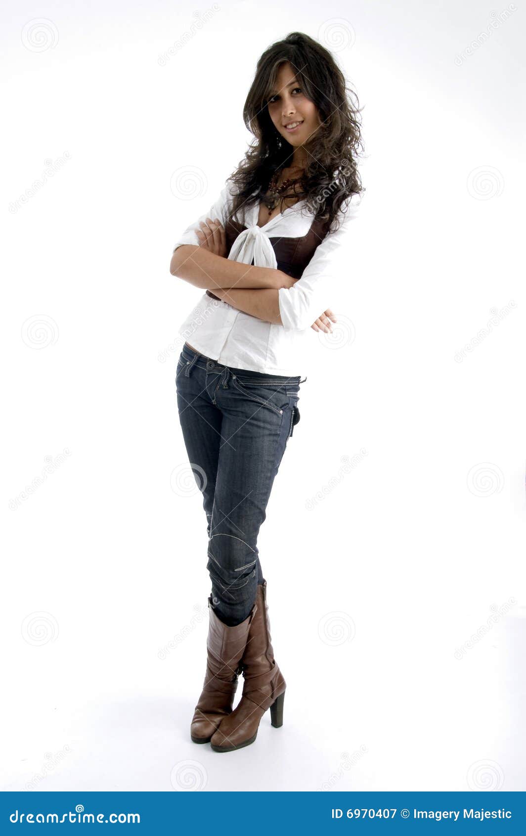 Young Model Posing With Her Arms Crossed Royalty Free Stock Photography