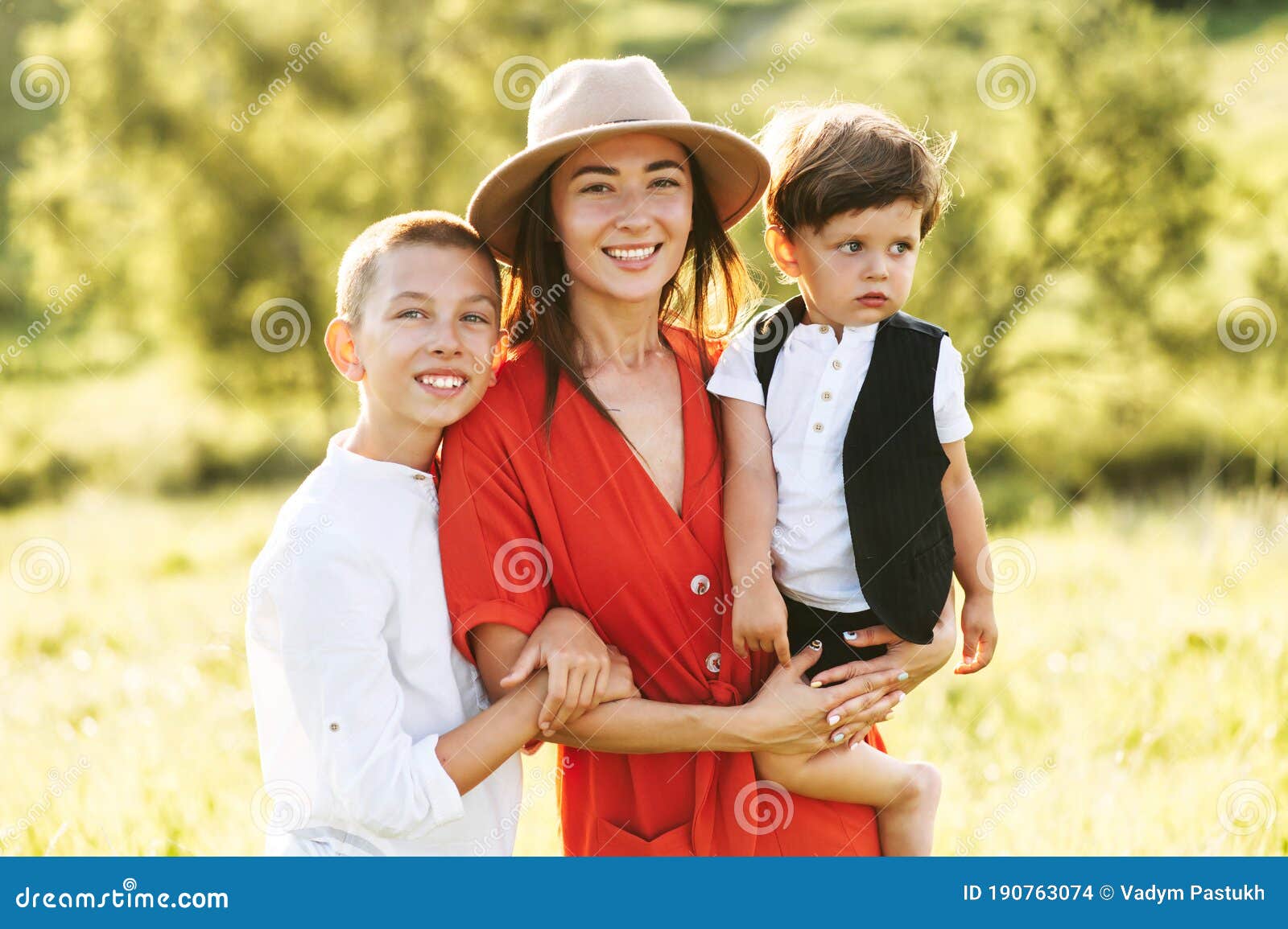 Young Mom With Two Sons On Nature Stock Photo Image Of Bl