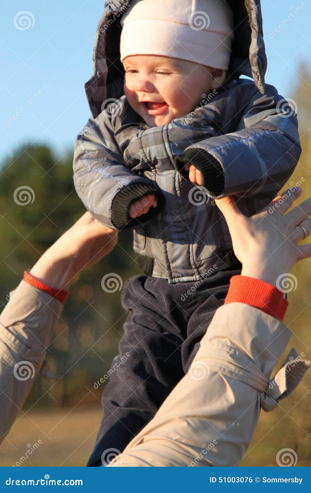 Young mother throwing baby stock photo. Image of family 51003076