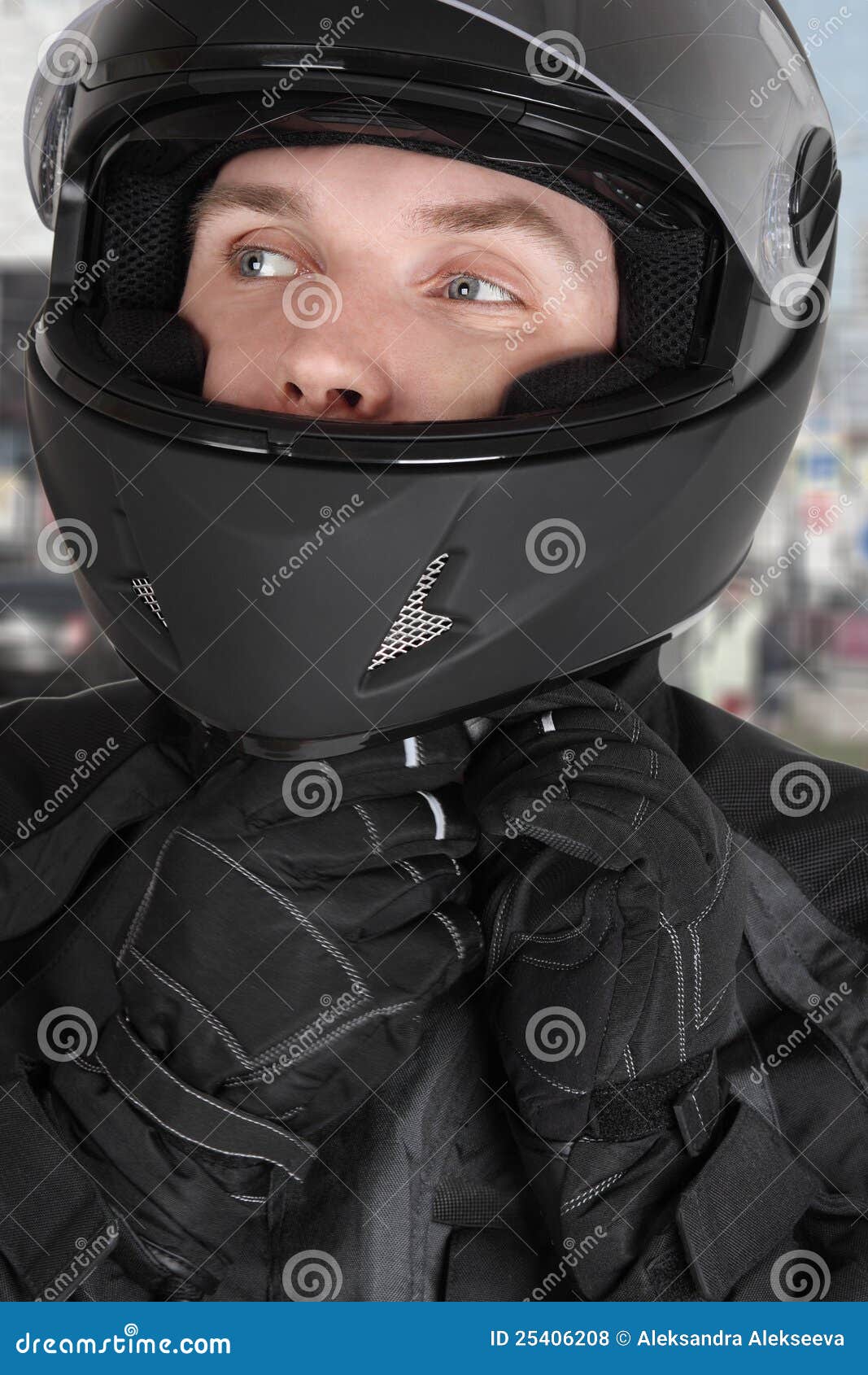 young motorcyclist man wearing helmet