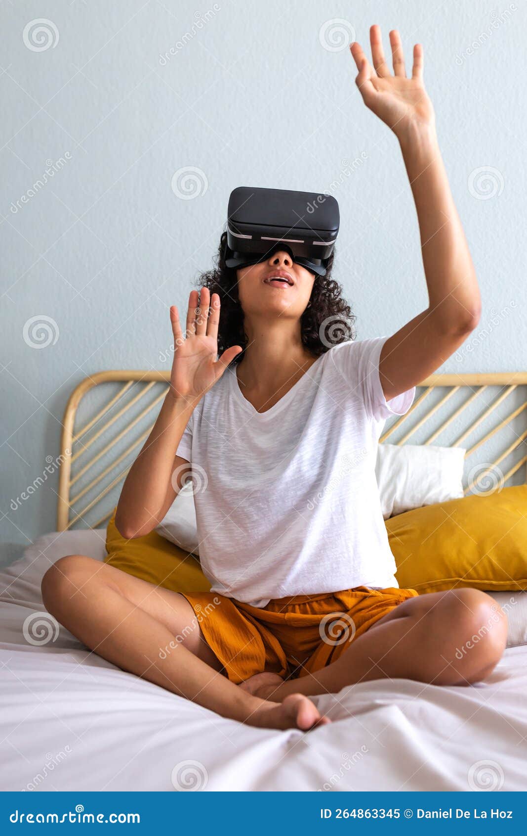 Young Multiracial Latina Woman Moving Hands Touching Objects in 3D