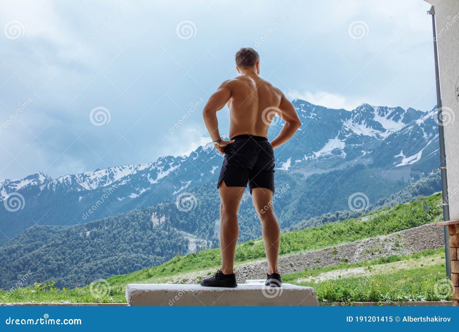 Young Muscular Man Meditating on Rock Stock Image Image of beautiful 