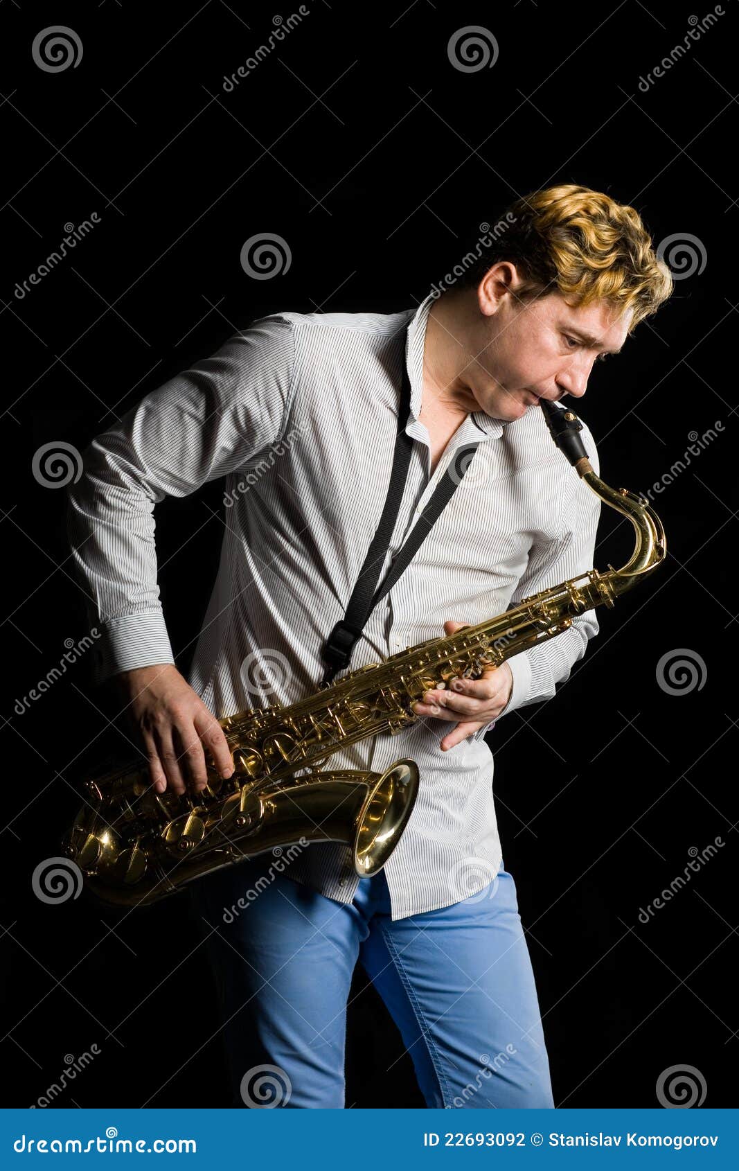 Young Musician with a Saxophone Stock Photo Image of holding, casual