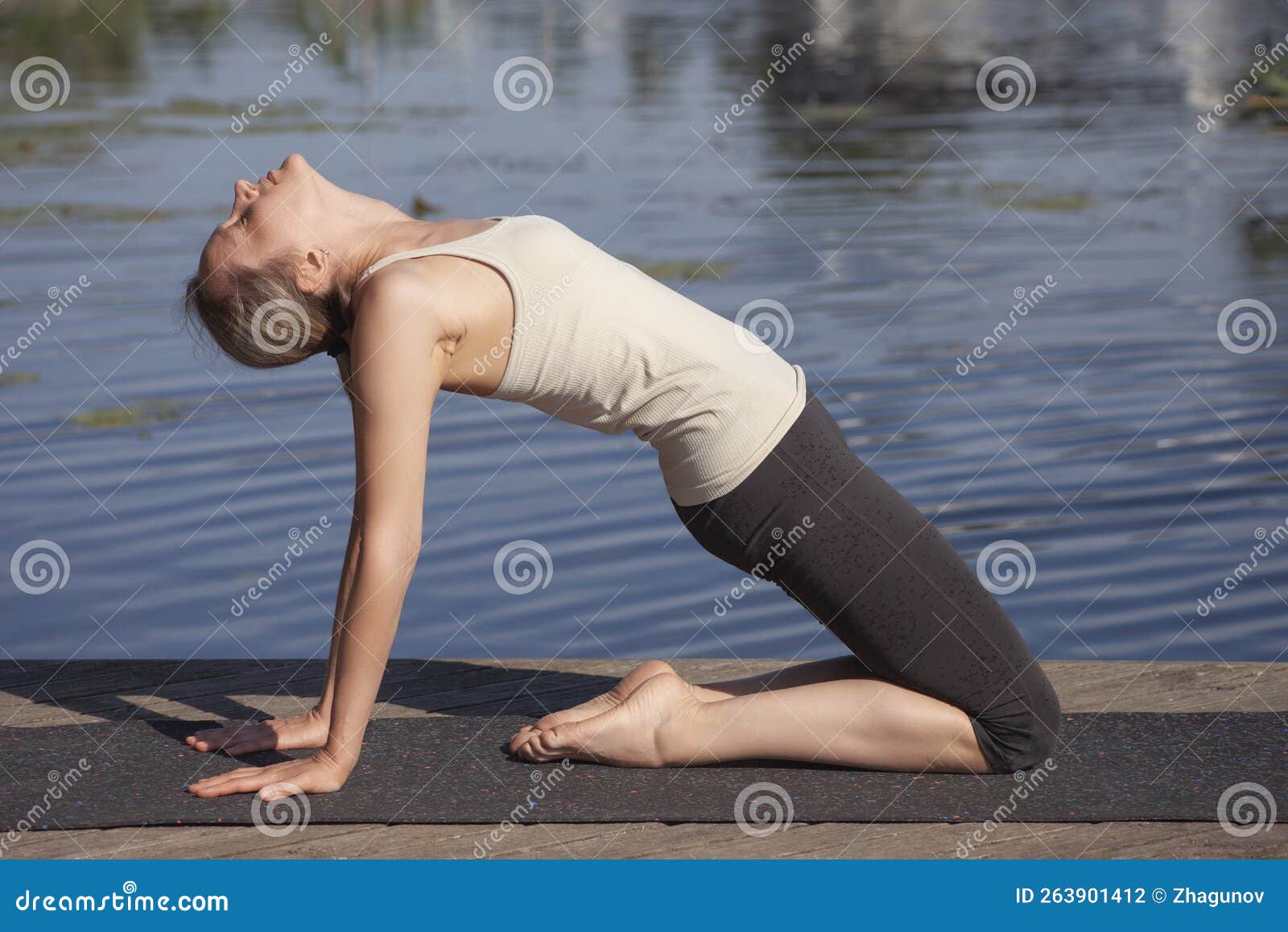 Young Naked Woman Practices Yoga on the Beach Stock Photo Image of