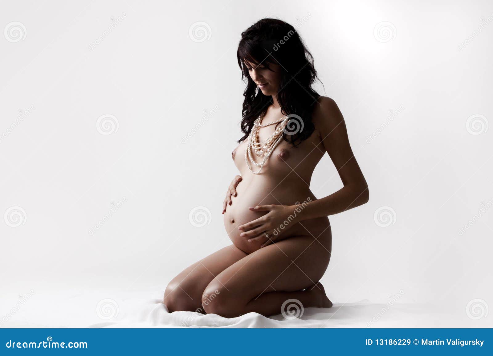 pregnant woman nude Nude pregnant woman at 38 weeks lying on the floor Stock ...