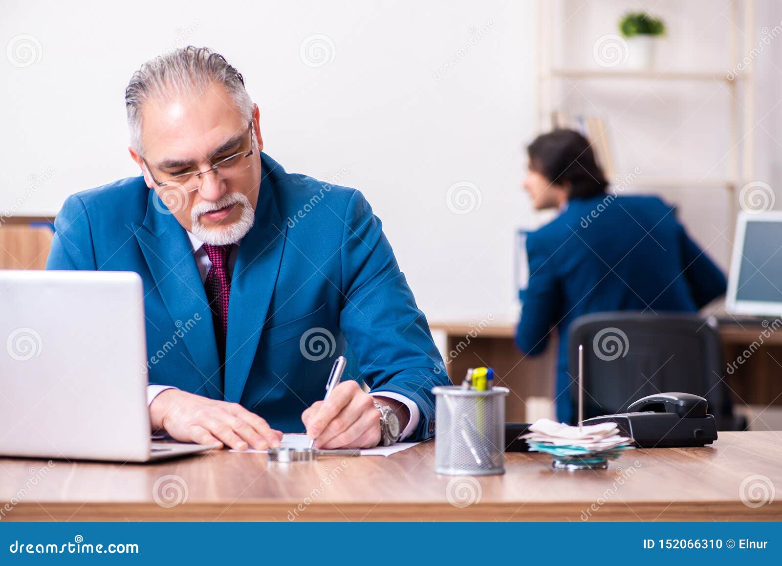 Young and Old Employees Working Together in the Office Stock Photo ...