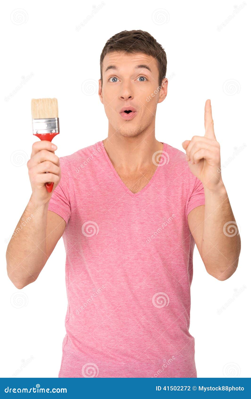 Young Painter Holding Paint Brush. Stock Photo Image of designer