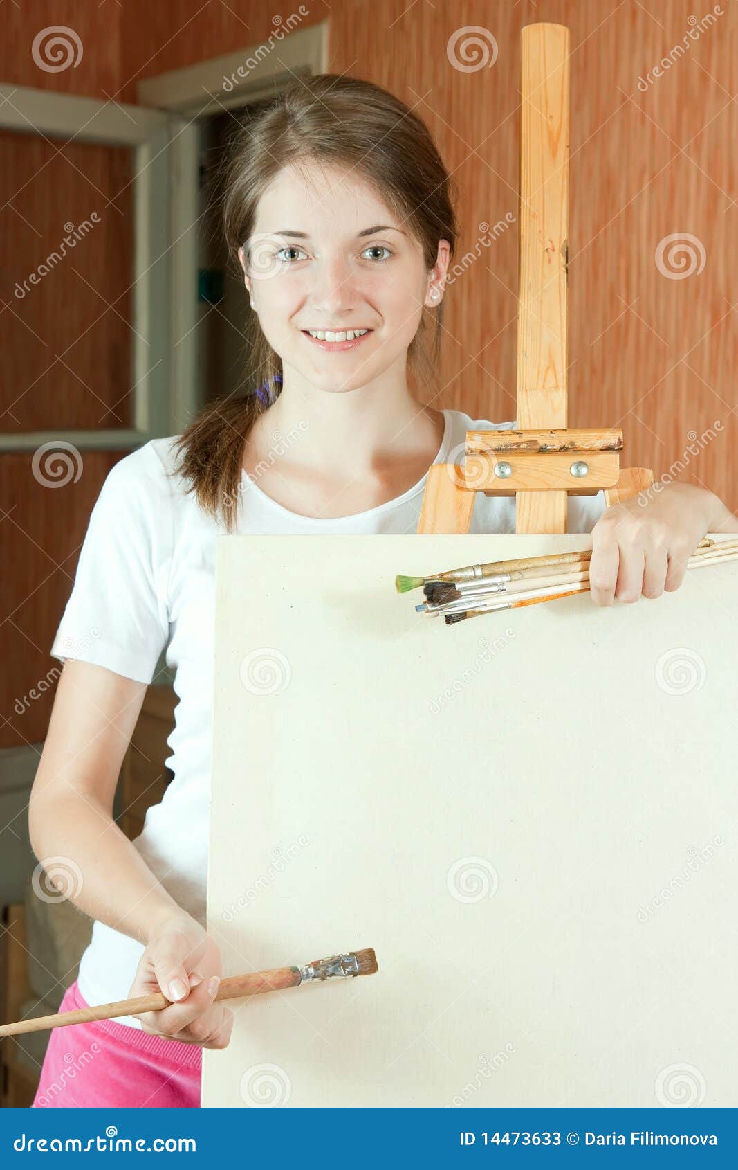 Young painter near easel stock image. Image of beauty 14473633