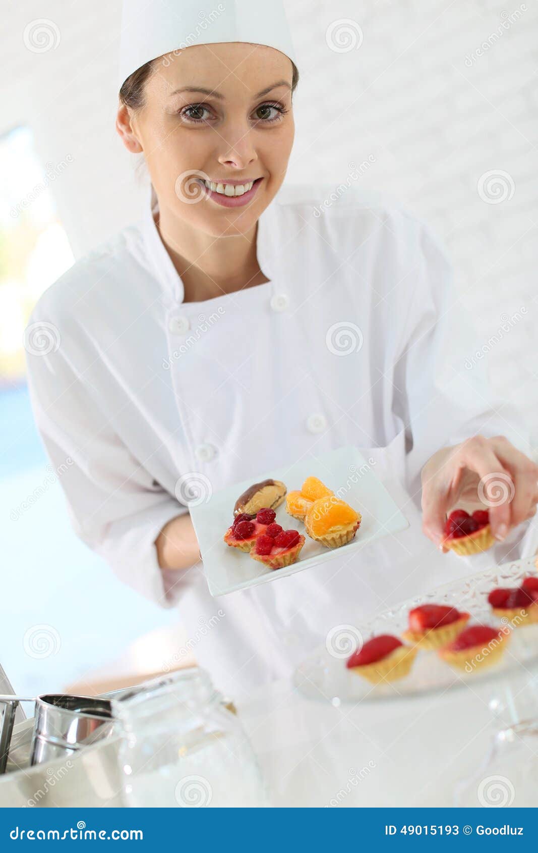 Young Pastry Chef Preparing Little Pastries Stock Image Image of trainee, preparing 49015193