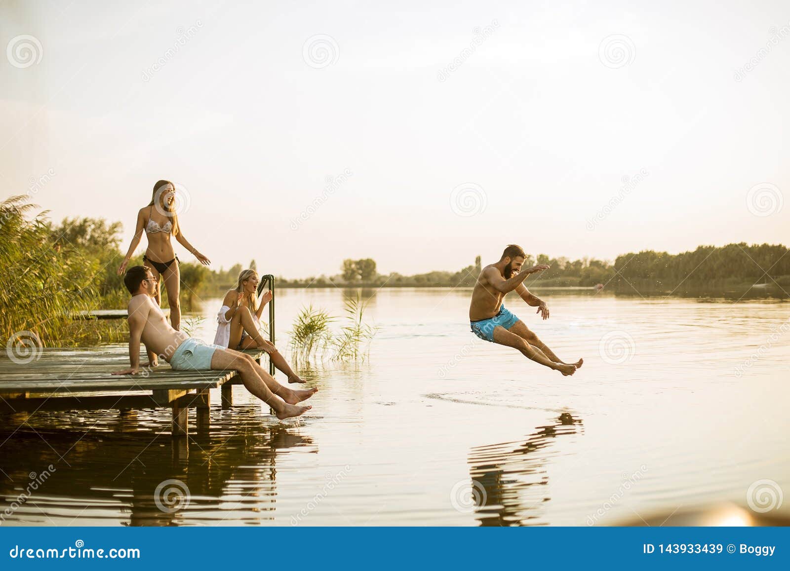 Young People Having Fun At The Lake On A Summer Day Stock Image Image