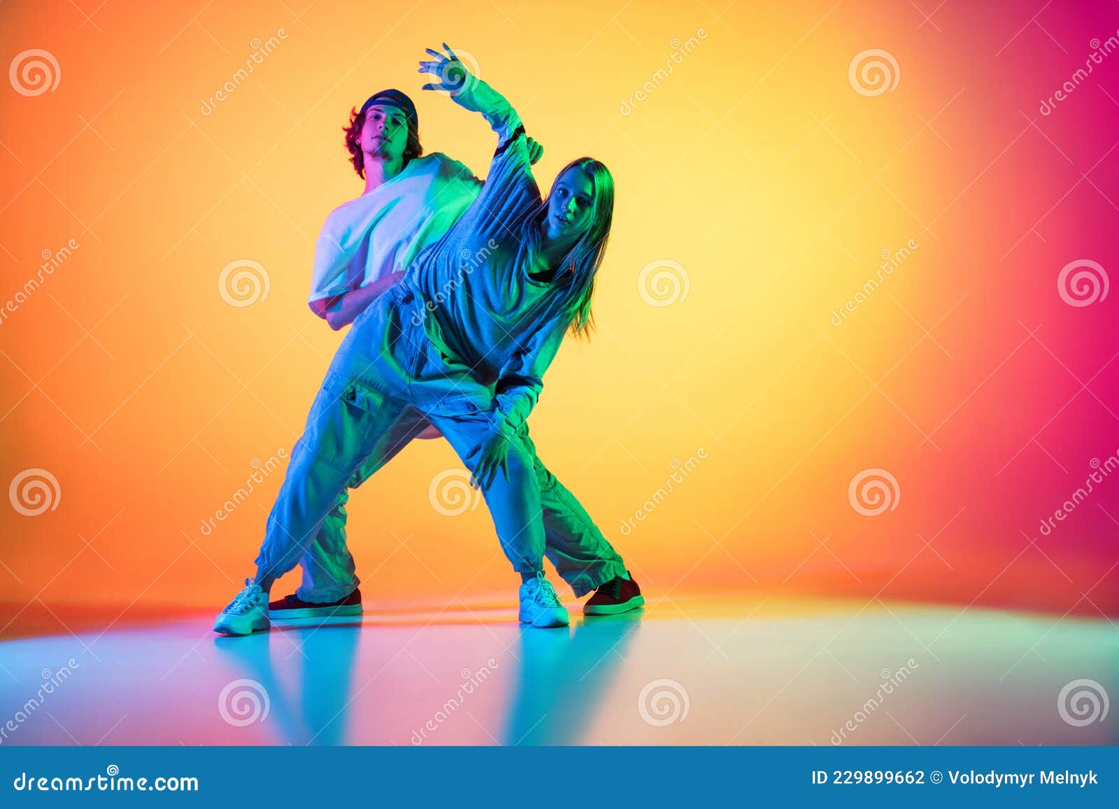 Young People, Hip-hop Dancers, Stylish Emotive Girl and Boy in Action and  Motion in Casual Sports Youth Clothes on Stock Photo - Image of excited,  dancer: 229899662