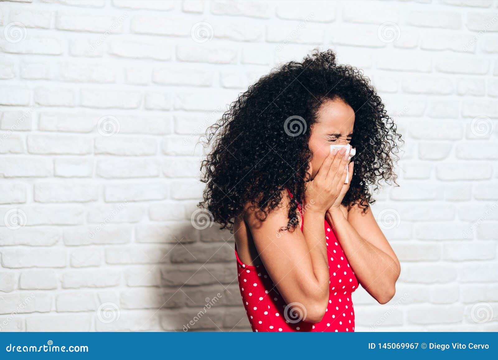 sick black woman african american girl sneezing for cold allergy