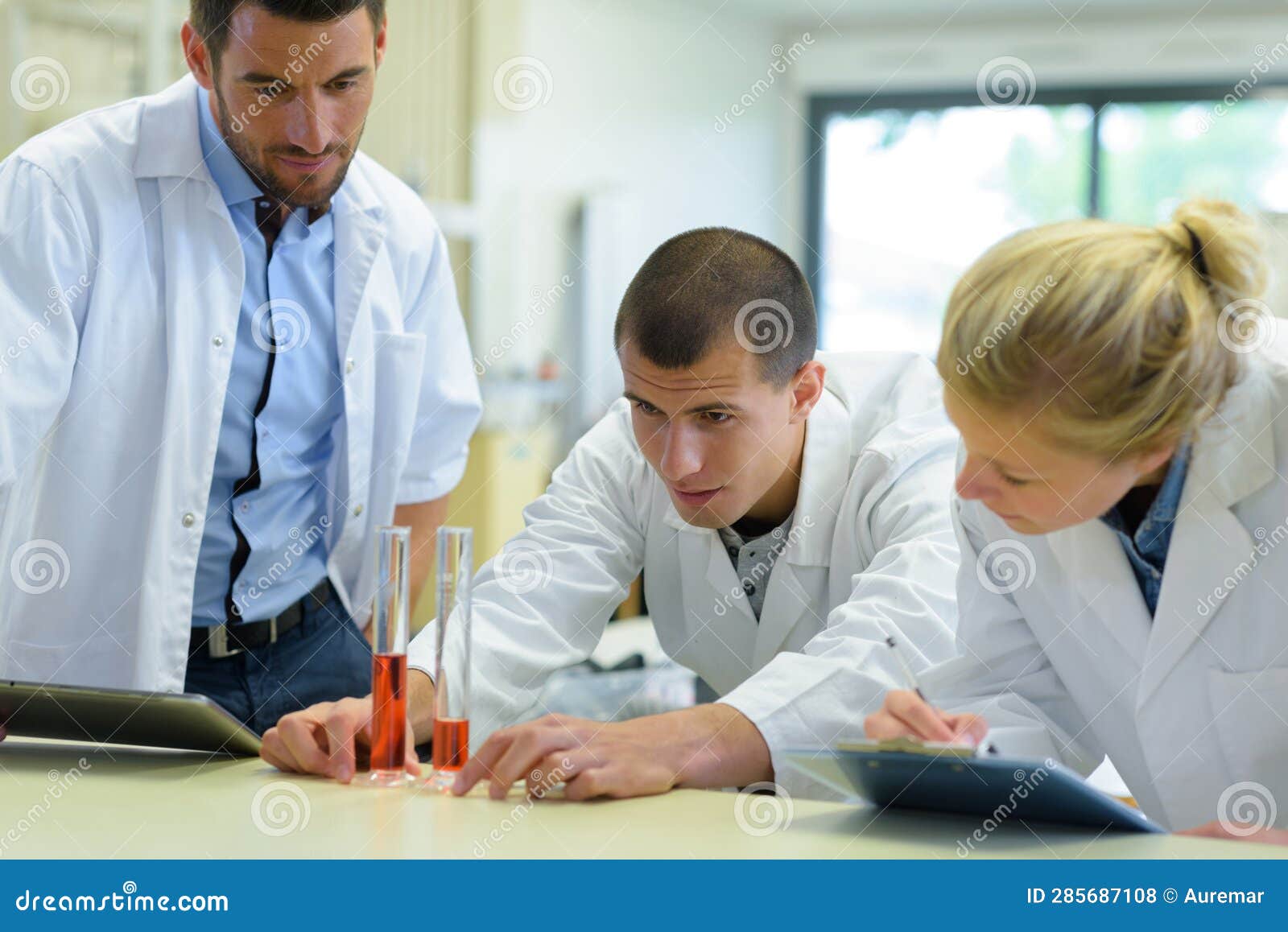 Young People and Life Science Researchers Stock Photo Image of