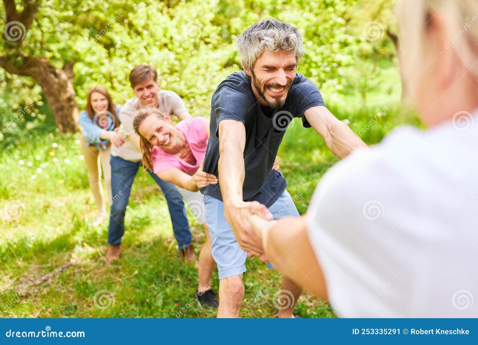 Young People Measuring Their Strength at the Team Event Stock Image ...