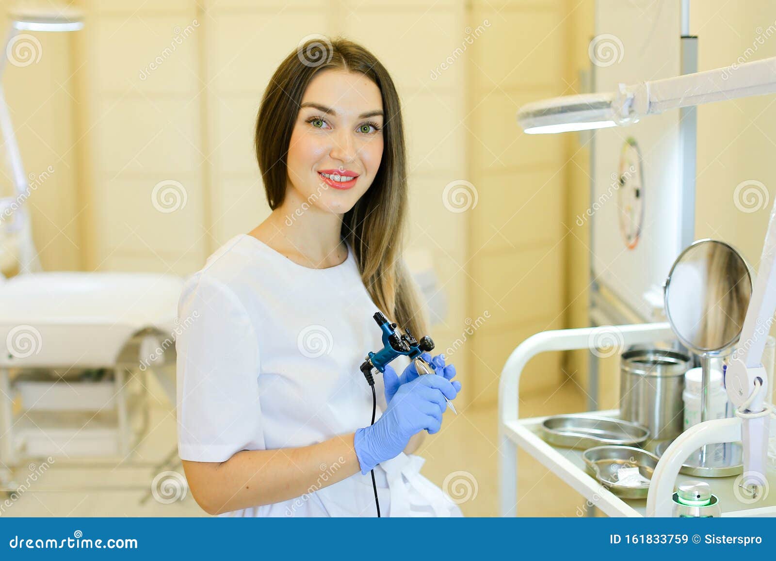 Young Permanent Makeup Artist Sitting with Microblading Beauty Salon. Stock Image - Image of gadget, keeping: 161833759