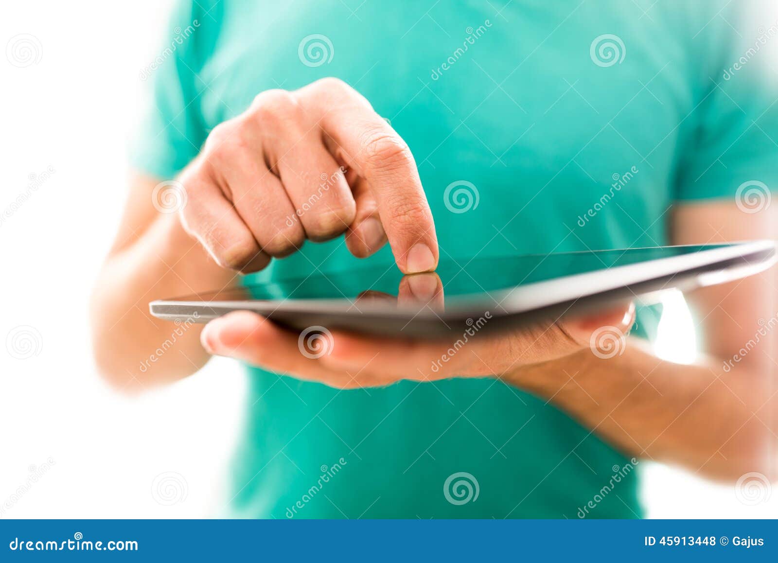 young person navigating a tablet