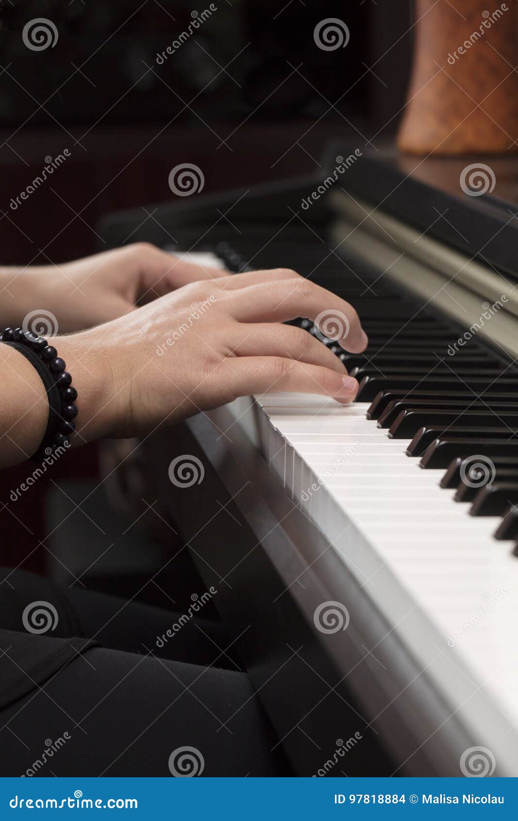 Young Person Playing the Piano with Both Hands Stock Photo - Image of