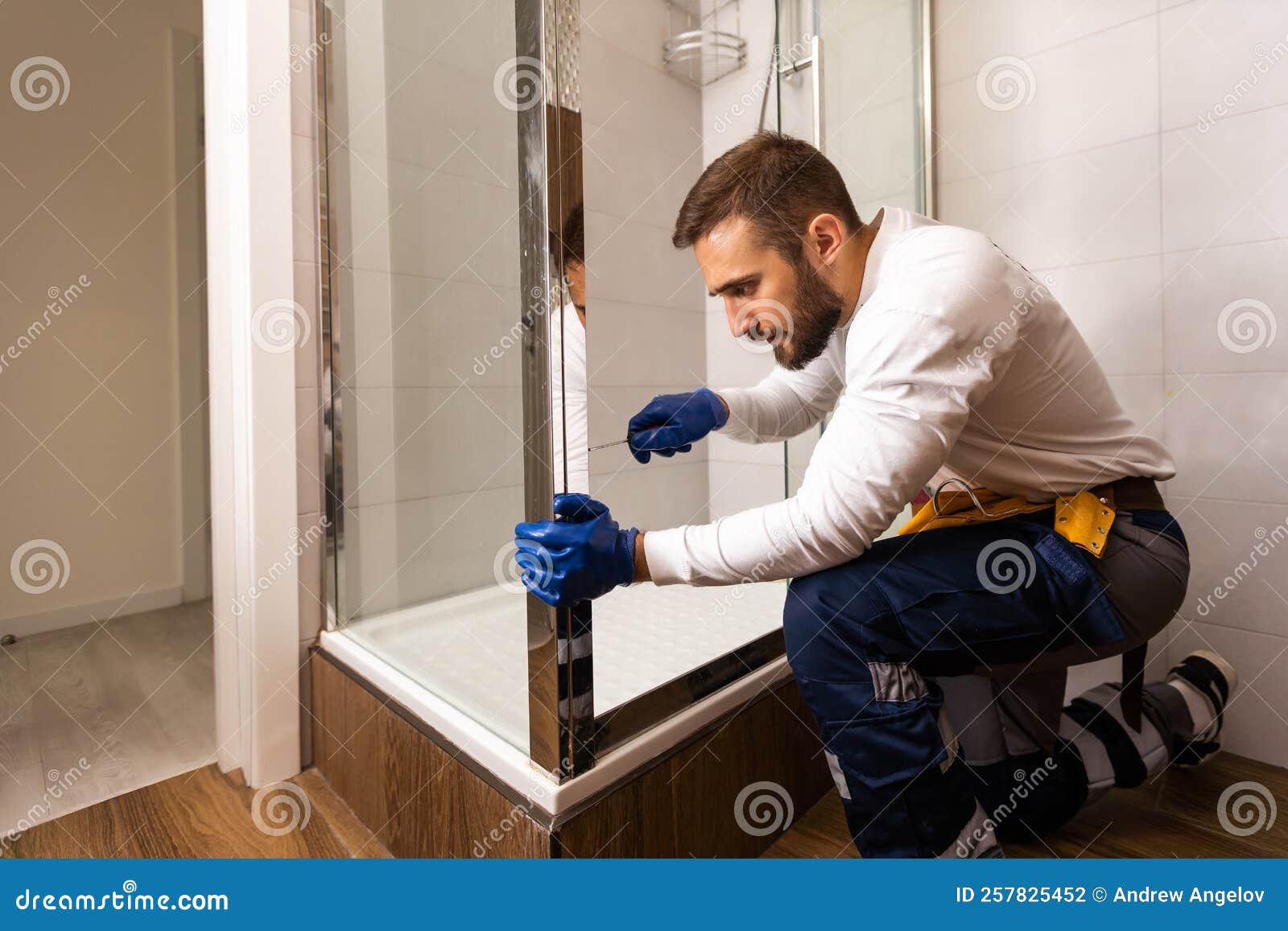 Young Plumber Fixing Shower Cabin Stock Photo Image of technical