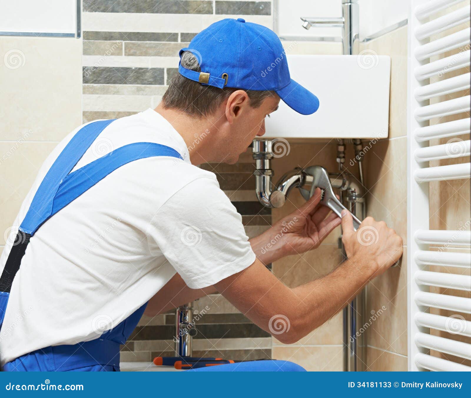 Young plumber man worker stock image. Image of equipment 34181133