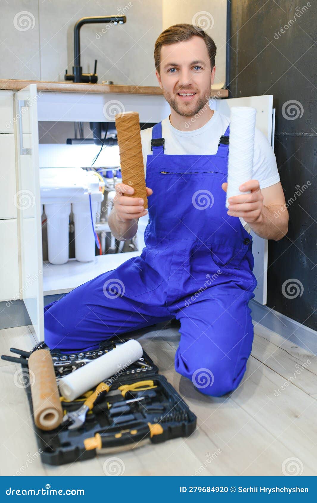 Young Plumber or Technician Installing or Repairing System of Water