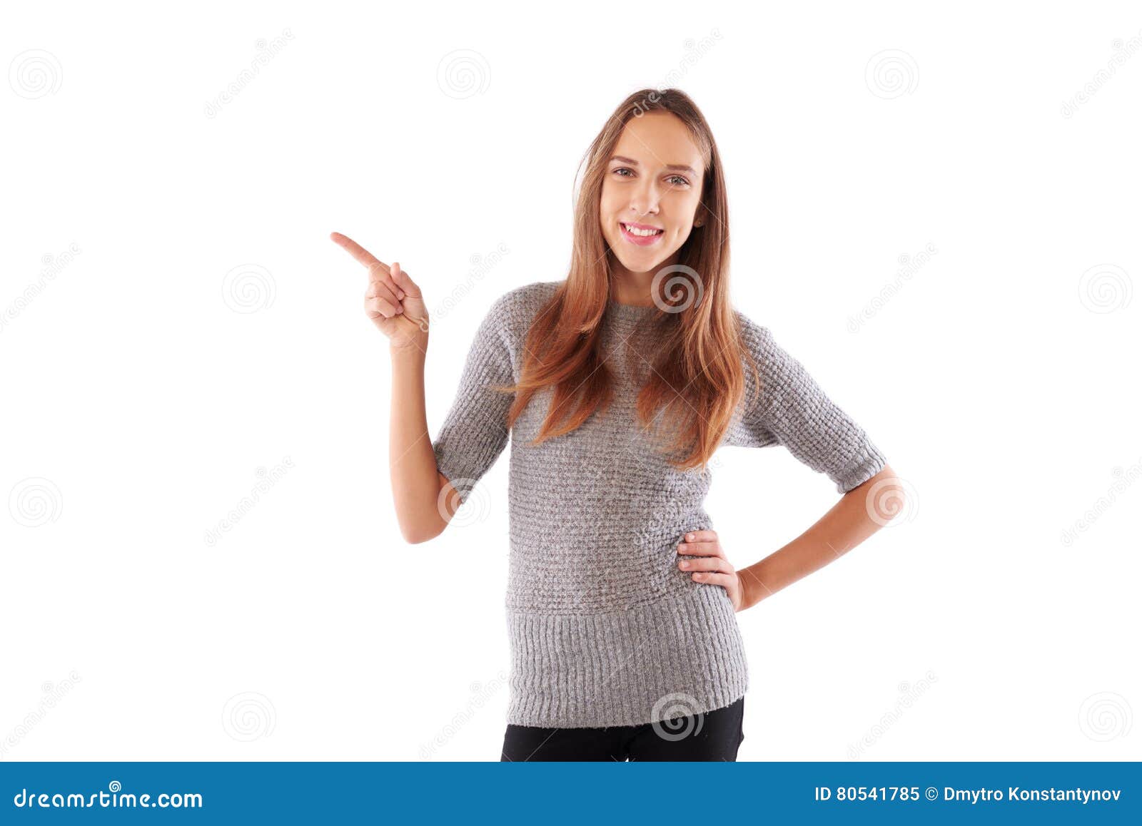 young positive woman point finger showing something to side empty copy space