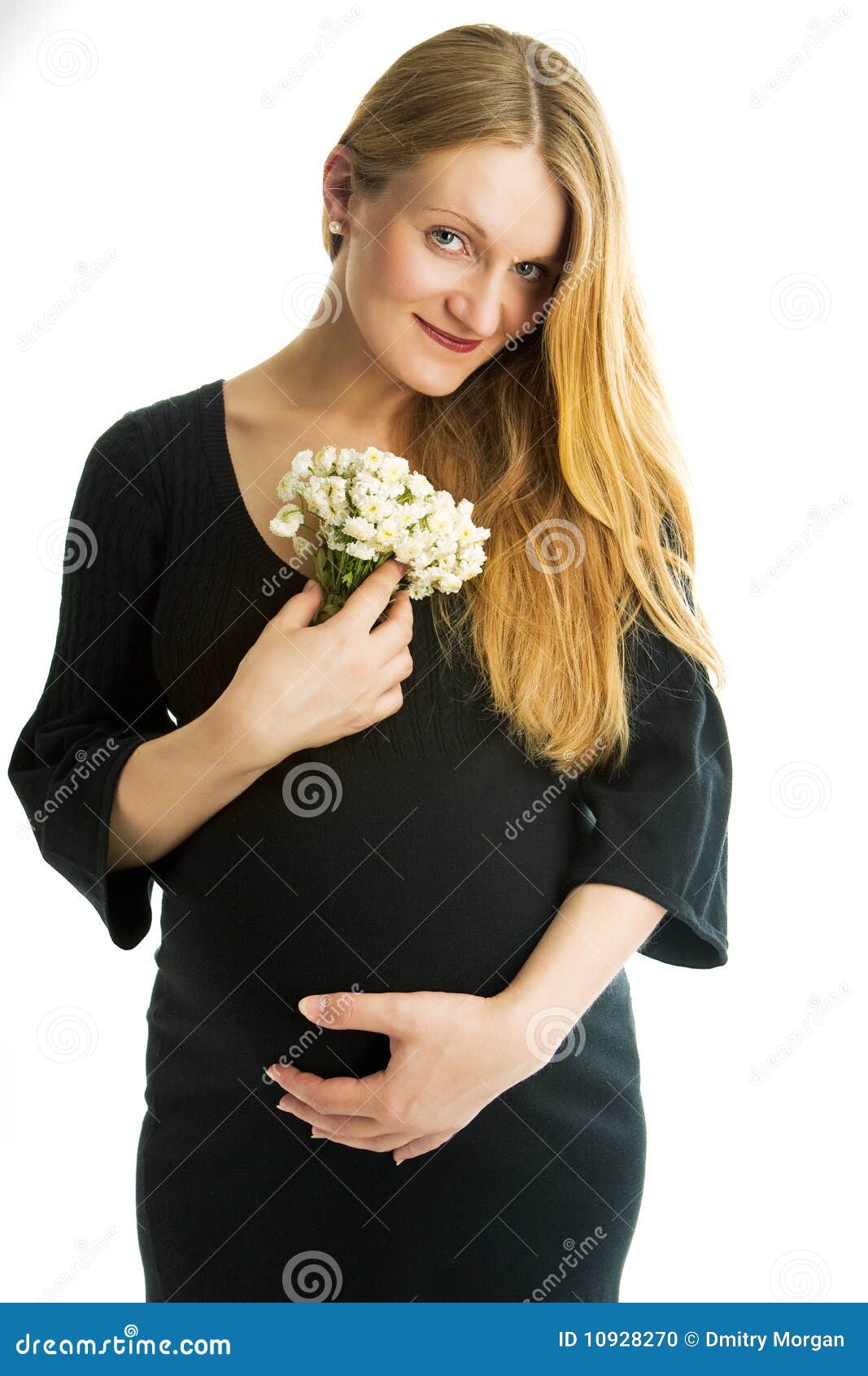 Young pregnant blonde woman smiling with flowers isolated on white