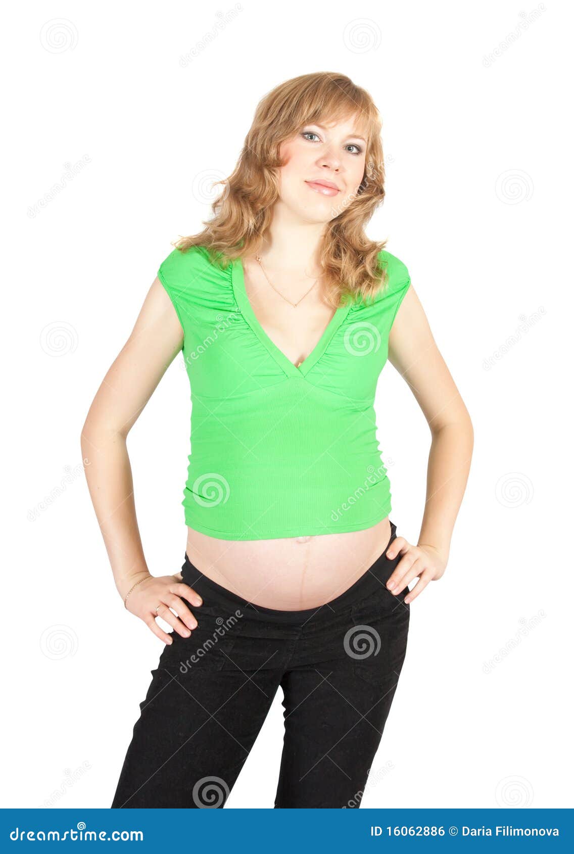 Young pregnant woman. Pregnant girl holding her belly, Isolated over white with clipping path