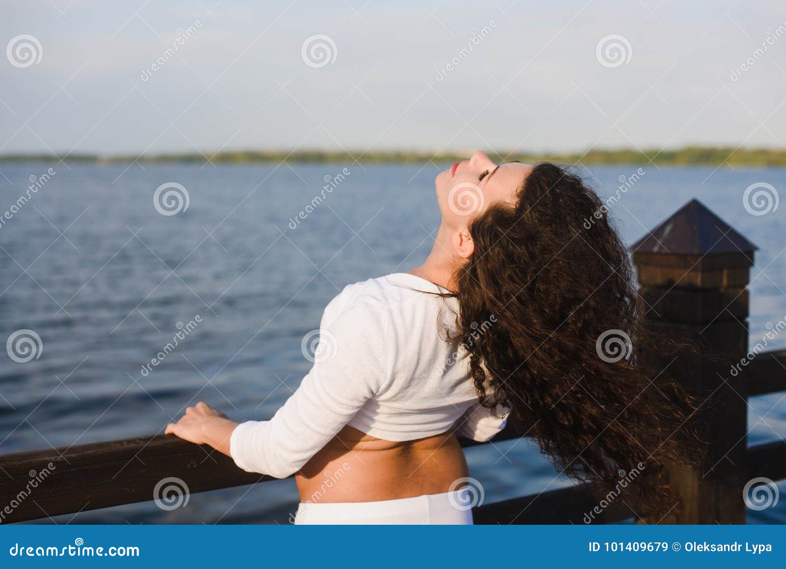 Young Pregnant Woman Doing Yoga by the River Stock Image - Image of ...