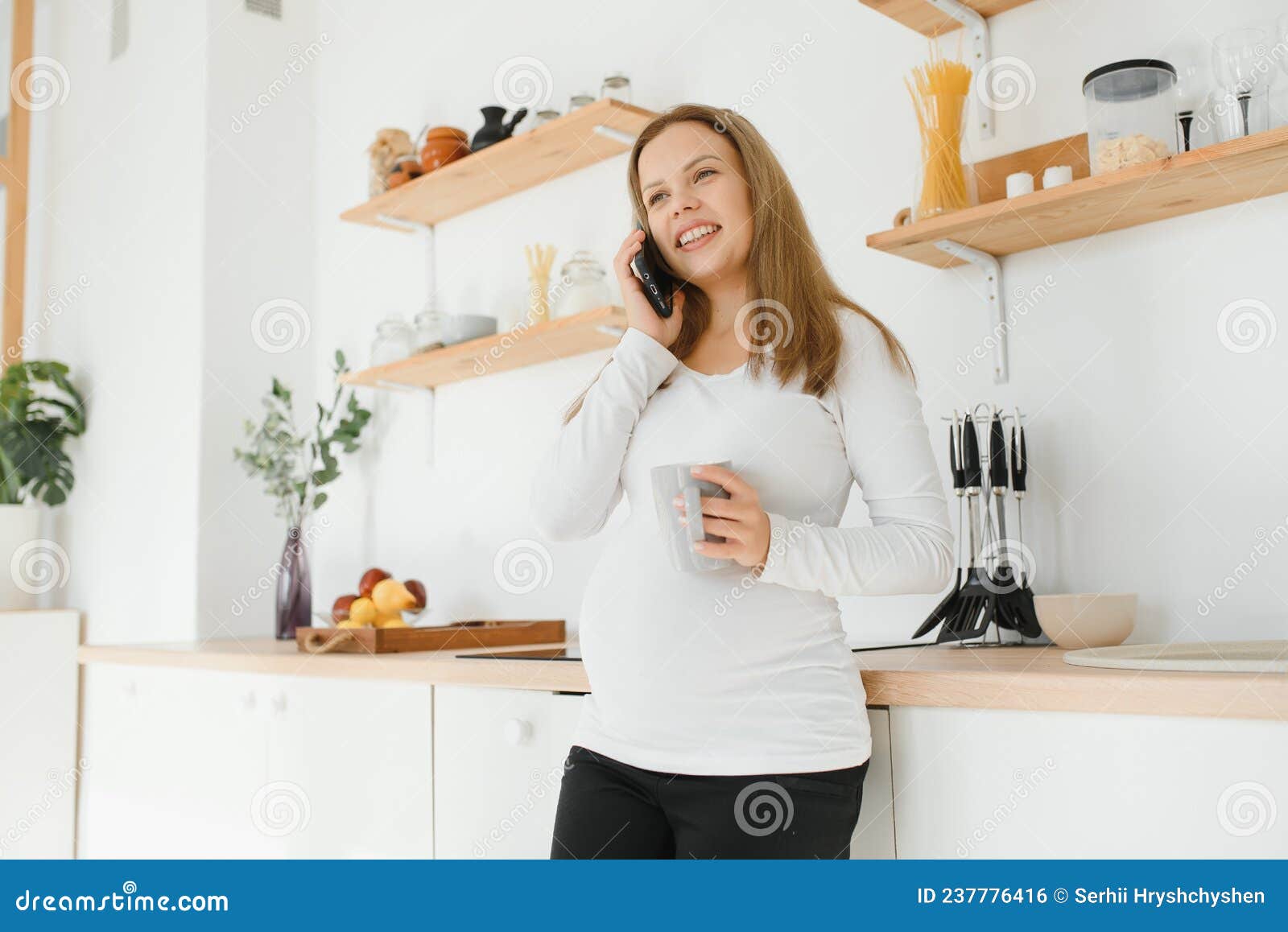 Young Pregnant Woman Drinking Tea in Kitchen Stock Photo Image of