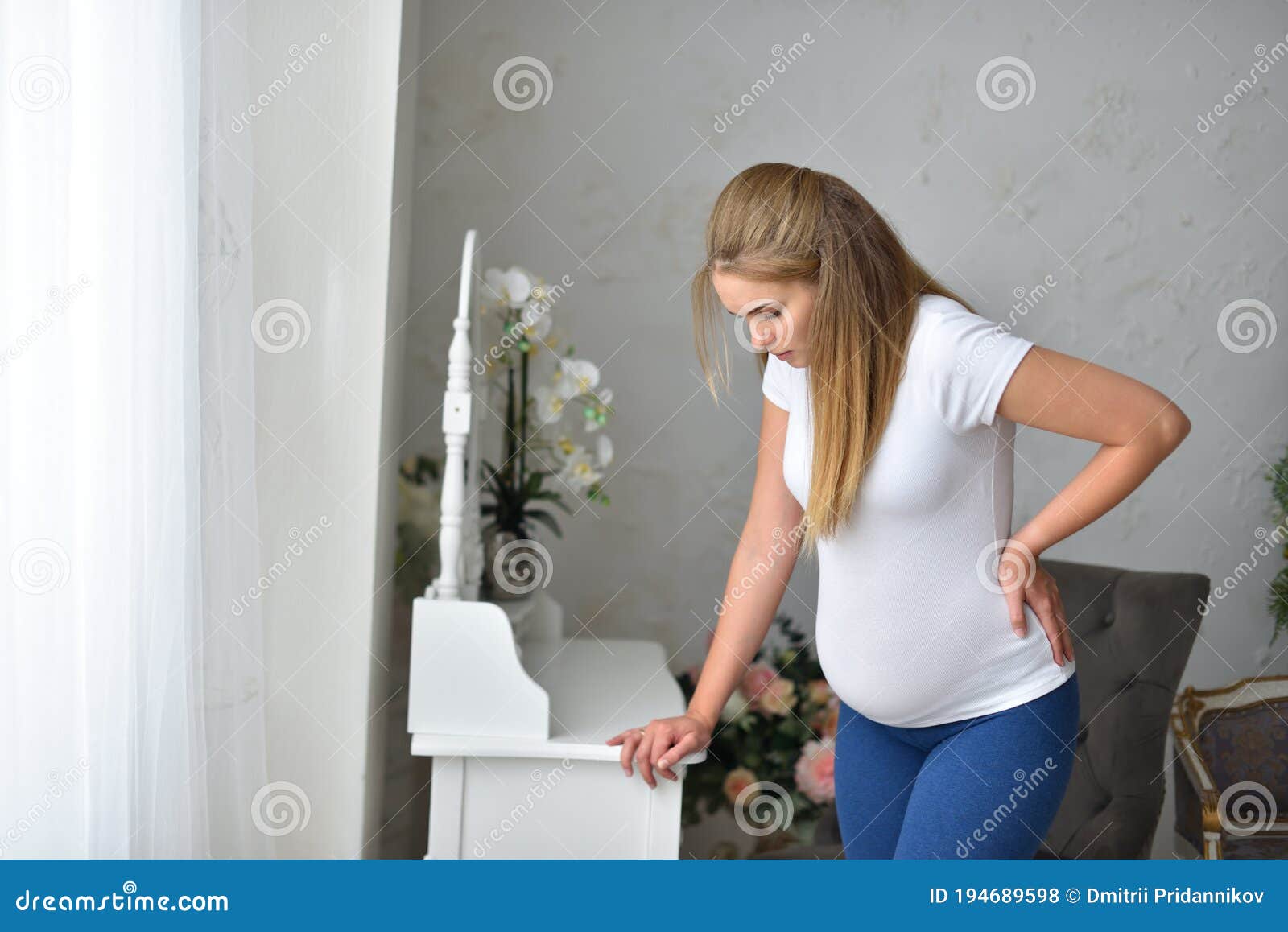 young pregnant woman feeling heaviness during pregnancy