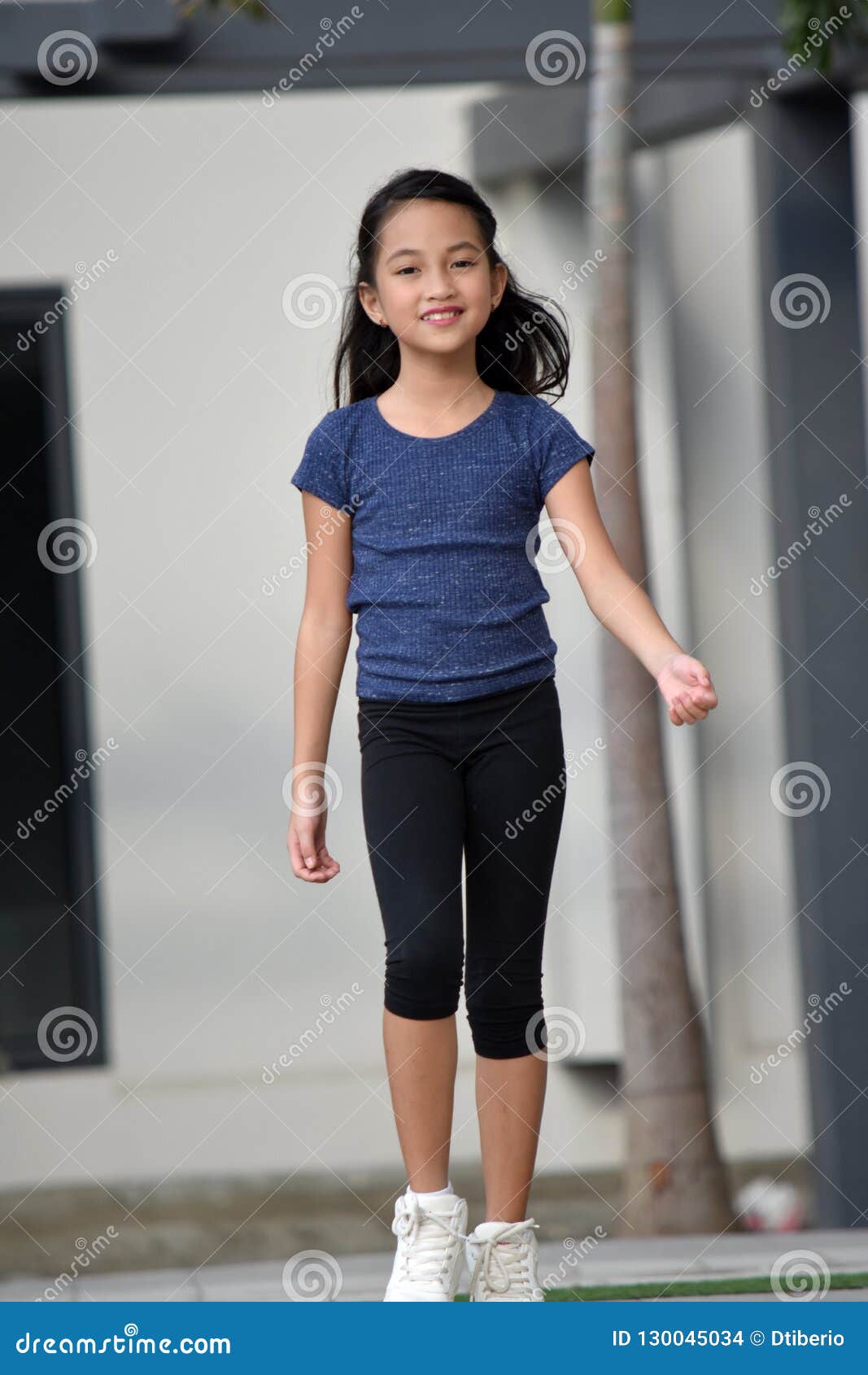 Young Filipina Tween Walking Stock Photo - Image of young, child: 130045034