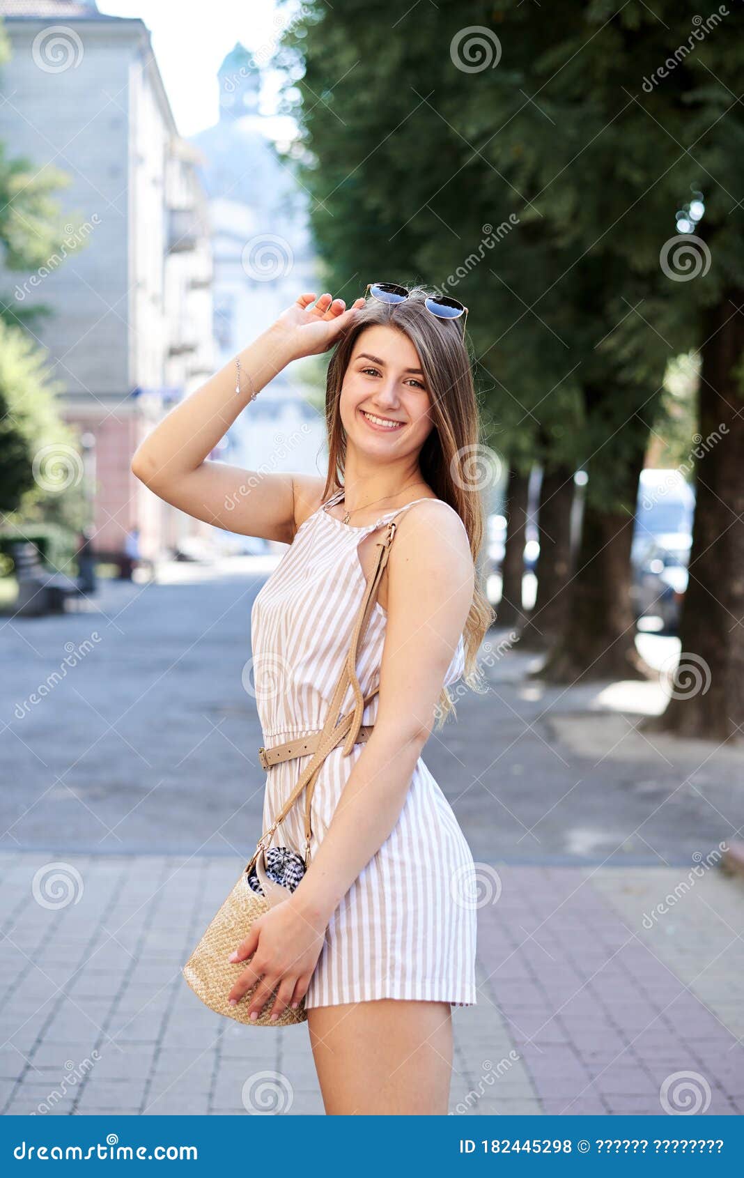 Young Pretty Blond Woman, Wearing White Stripy Short Overall, Walking ...