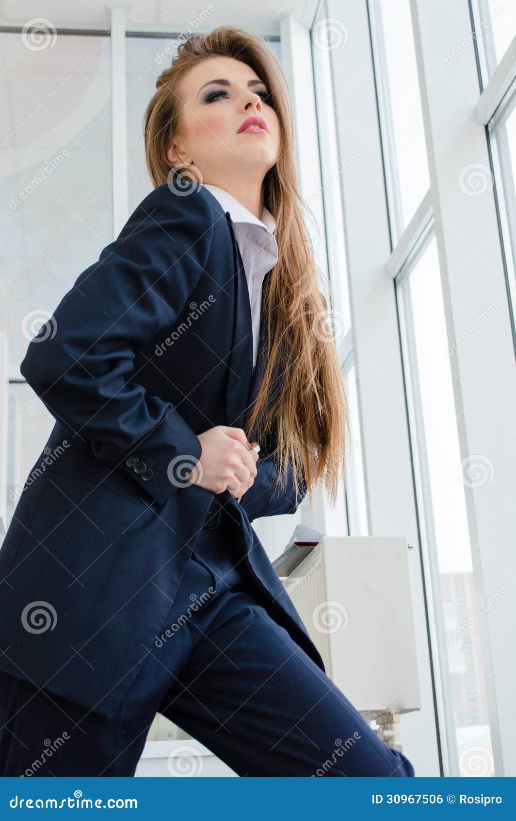 Young Pretty Business Woman Wearing Man's Suit In Office Stock Photo ...