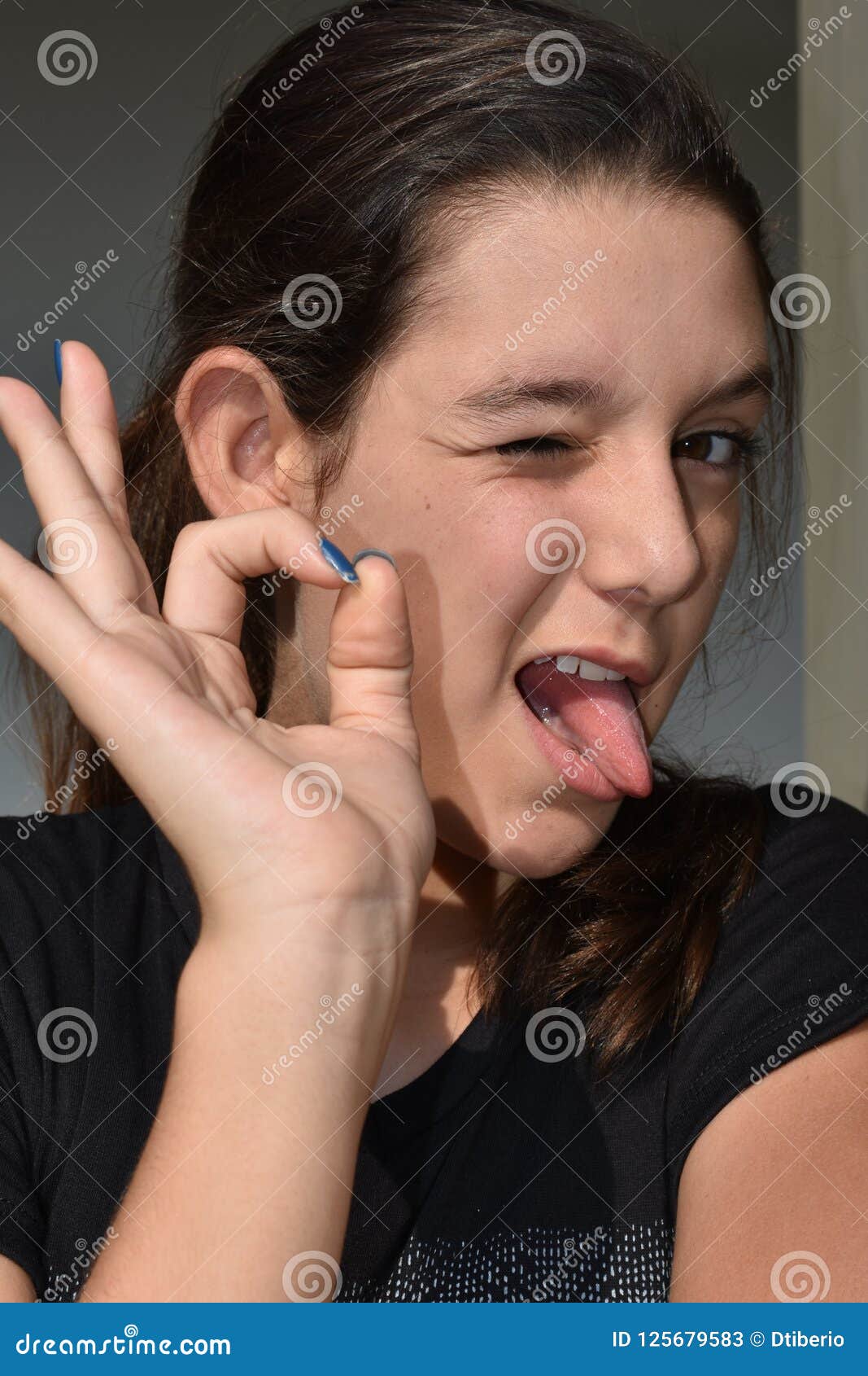 Latina Female Making Funny Faces Stock Image - Image of feelings, latina:  125679583