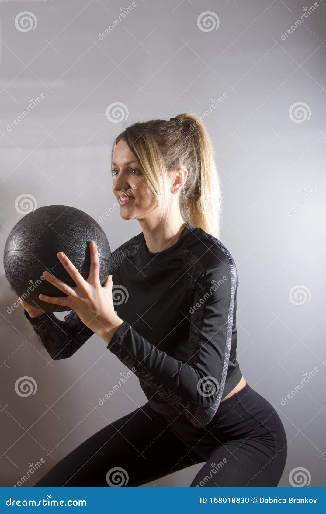 A Young Pretty Girl.Fitness Coach.Black Sportswear. Stock Photo - Image ...