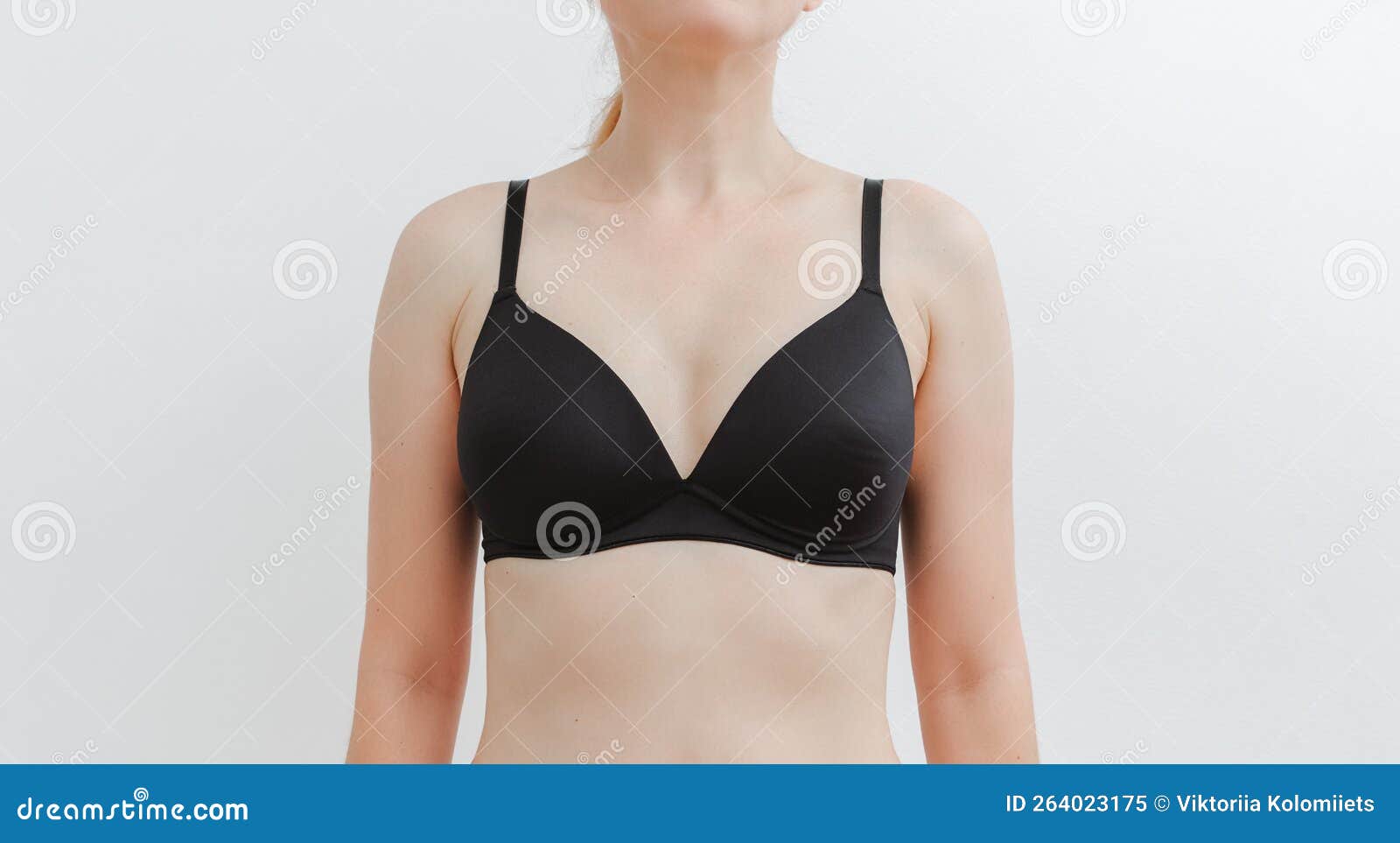 A Young Pretty Woman in a Black Bra. Stunning Girl in Underwear