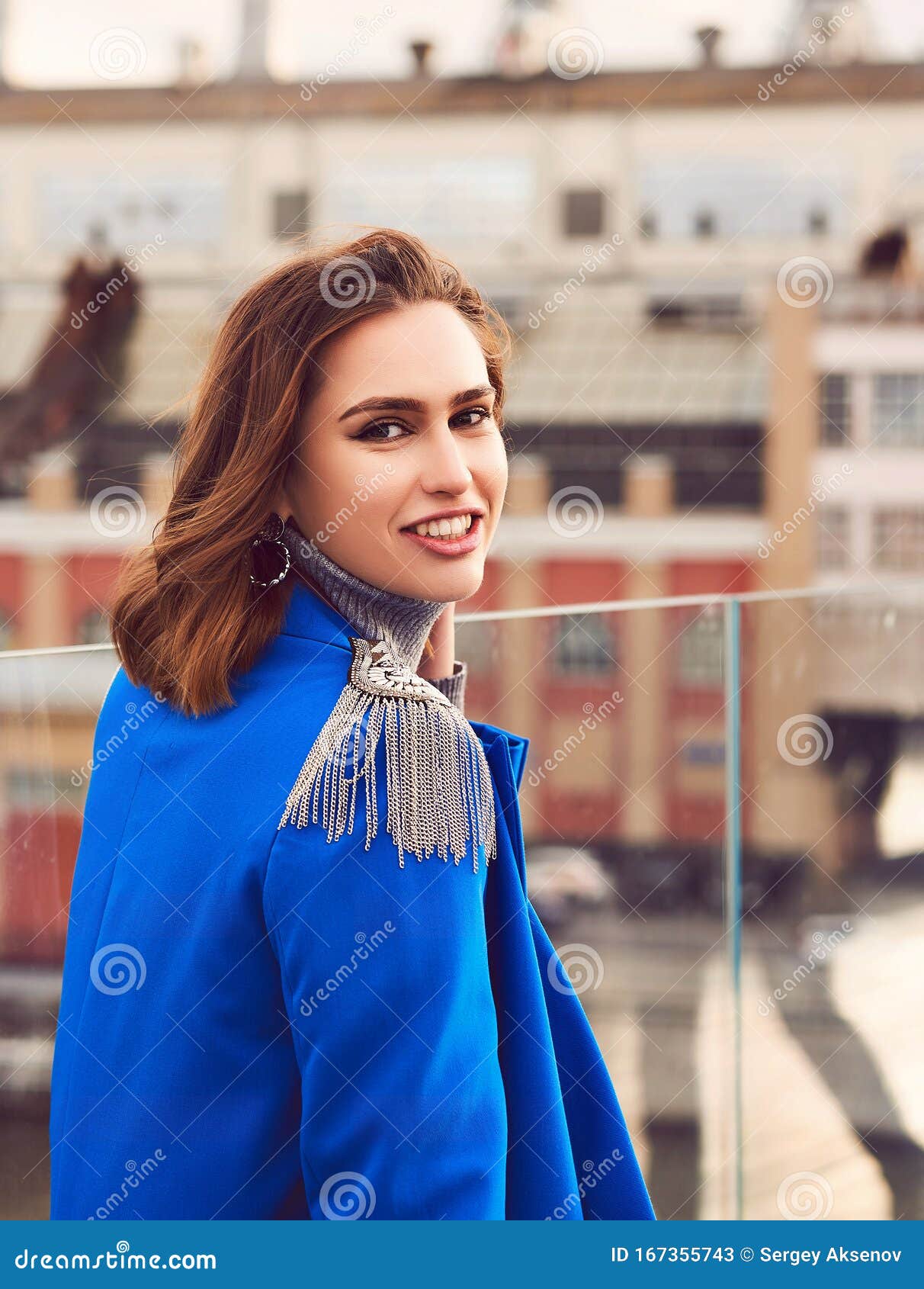 Young Pretty Woman in a Blue Suit Walking and Posing Outdoors Stock ...