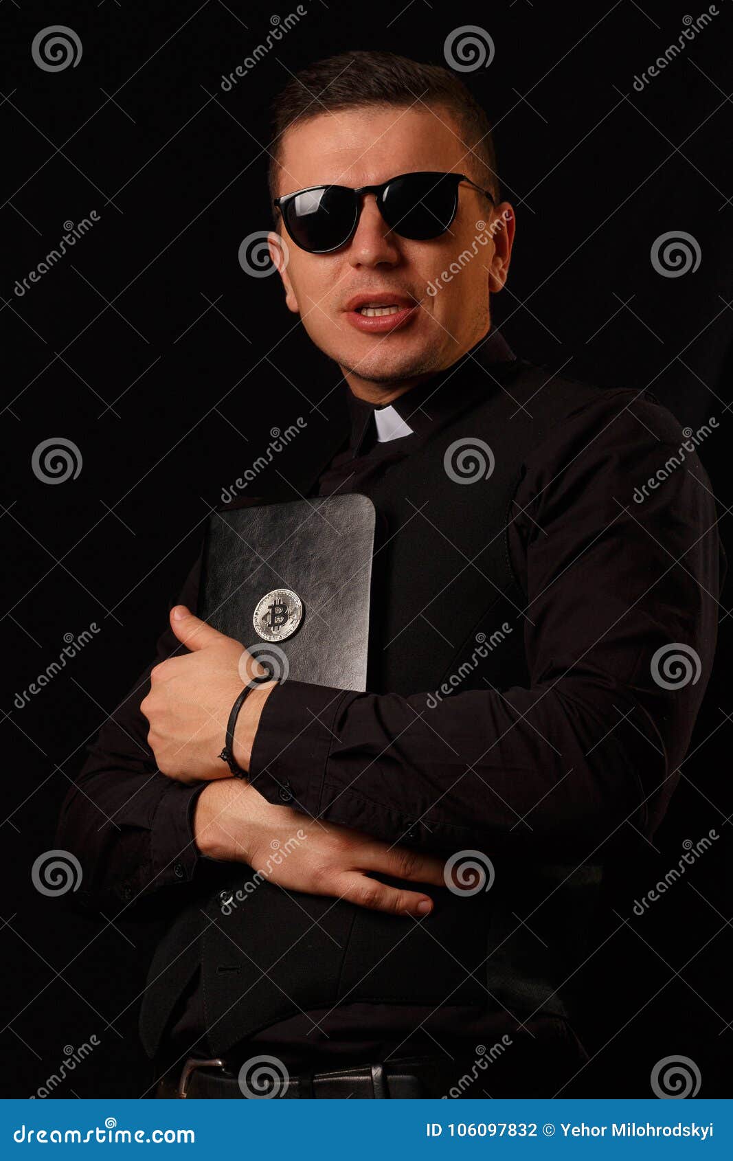 Young Priest Holding and Crypto Bible with Bitcoin Logo Stock Photo - Image  of hand, christian: 106097832