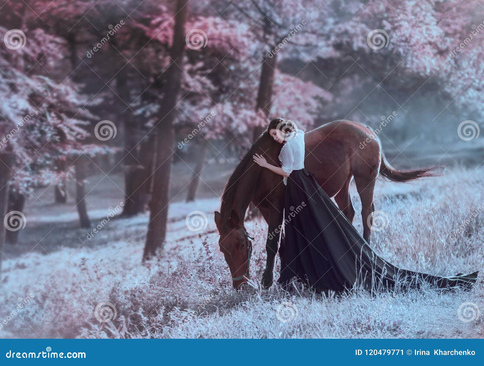 a young princess in a vintage dress with a long train, with tenderness and love, hugs her horse. the brunette girl in a