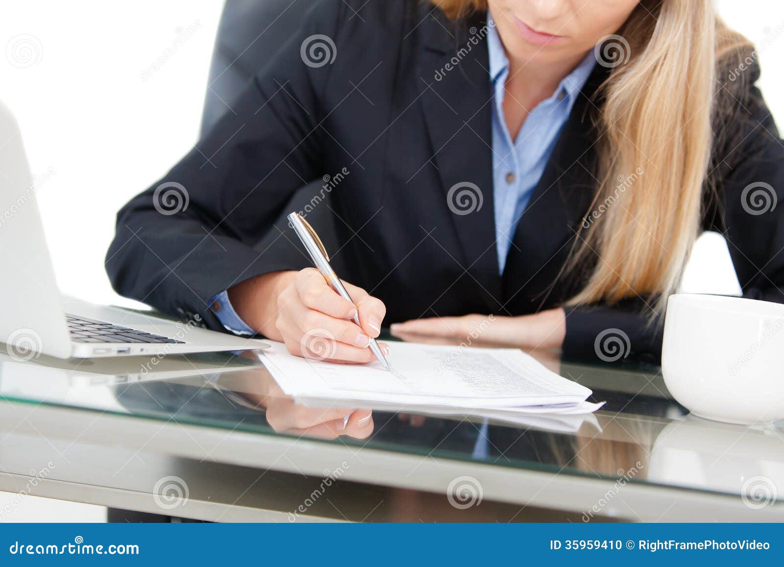 young professional business woman working at desk