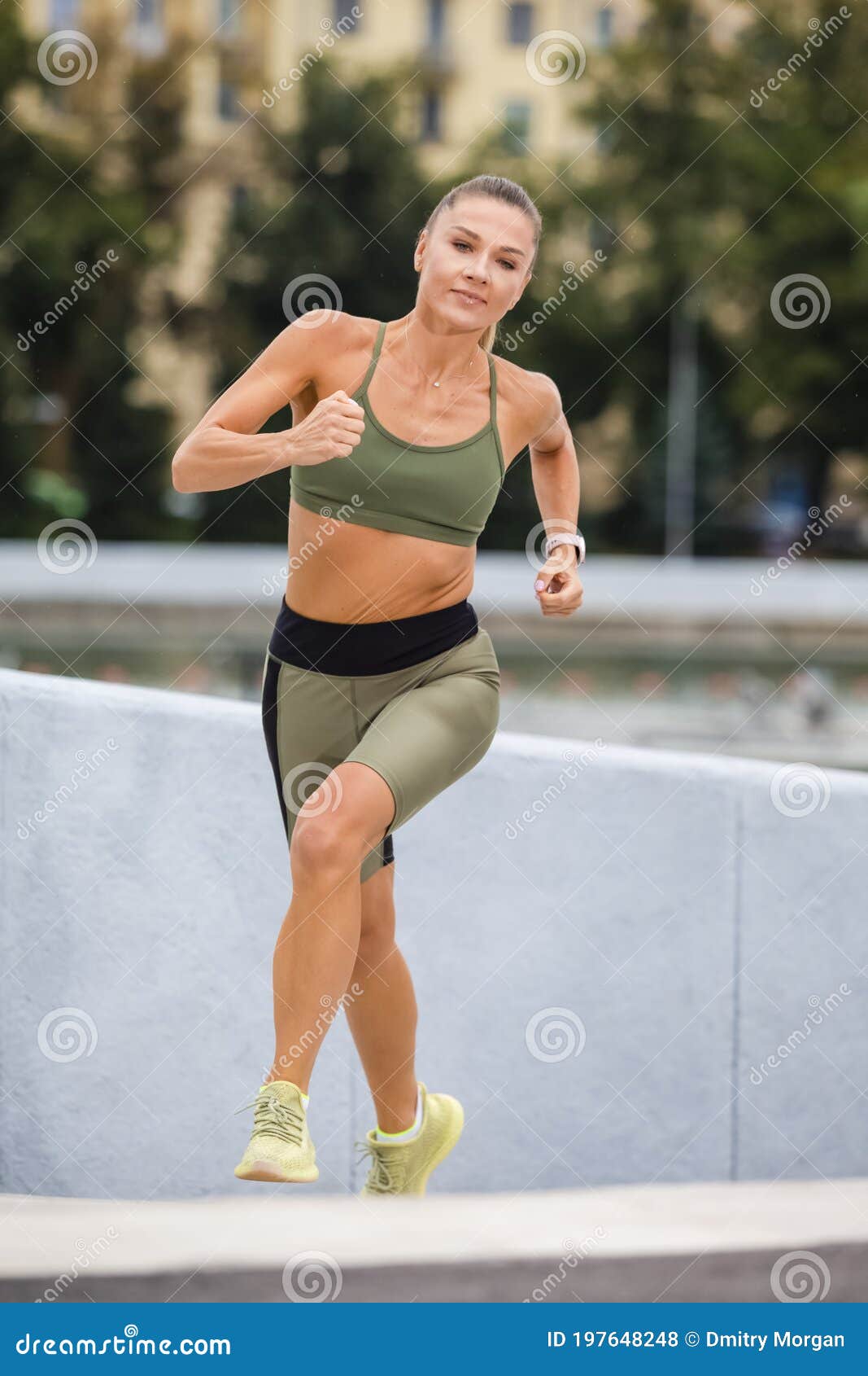 Young Professional Caucasian Female Runner in Jogging Outfit