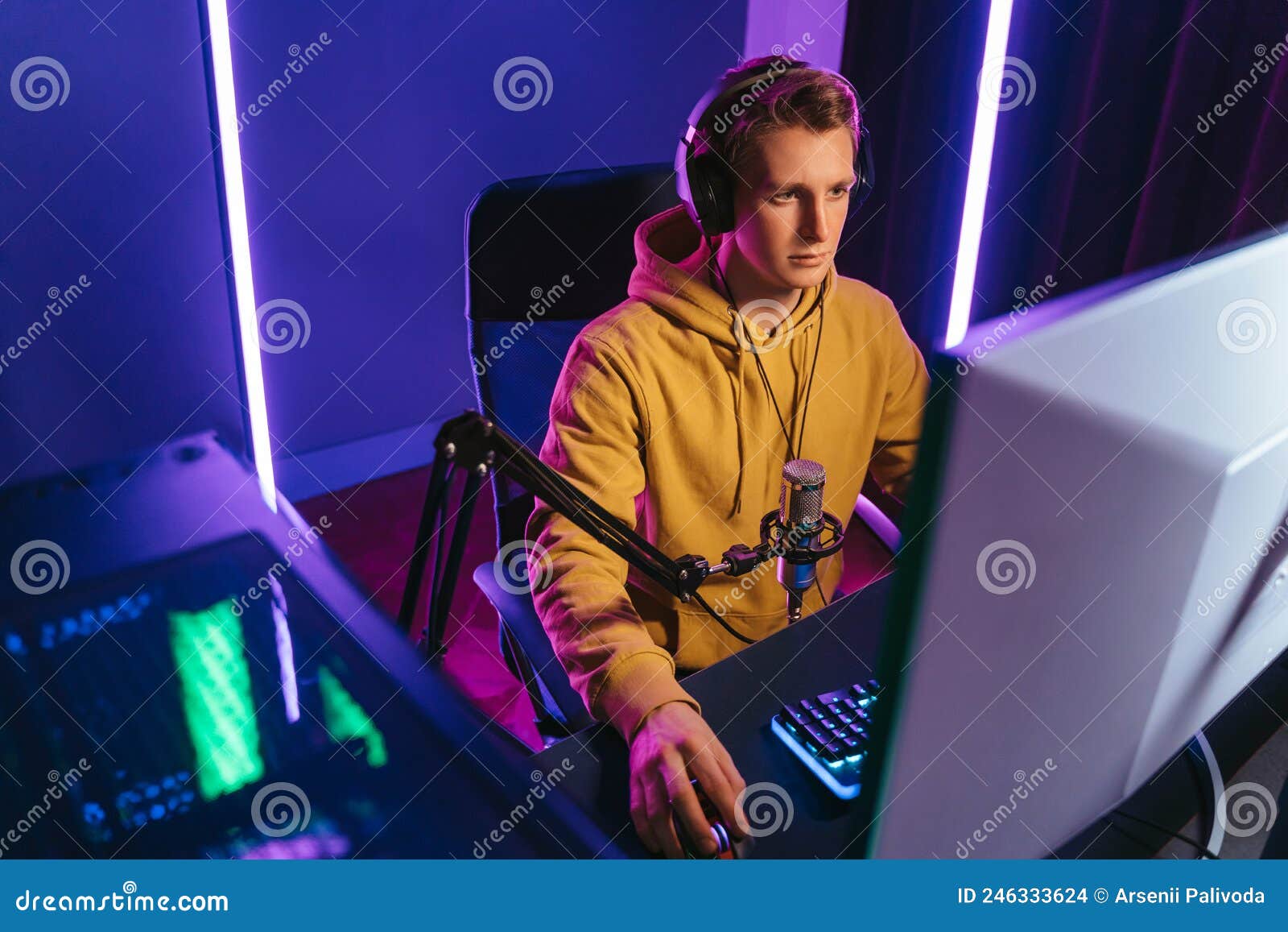 Handsome Pro Cyber Sportsman Streaming Live Video from Esport Tournament Stock Photo