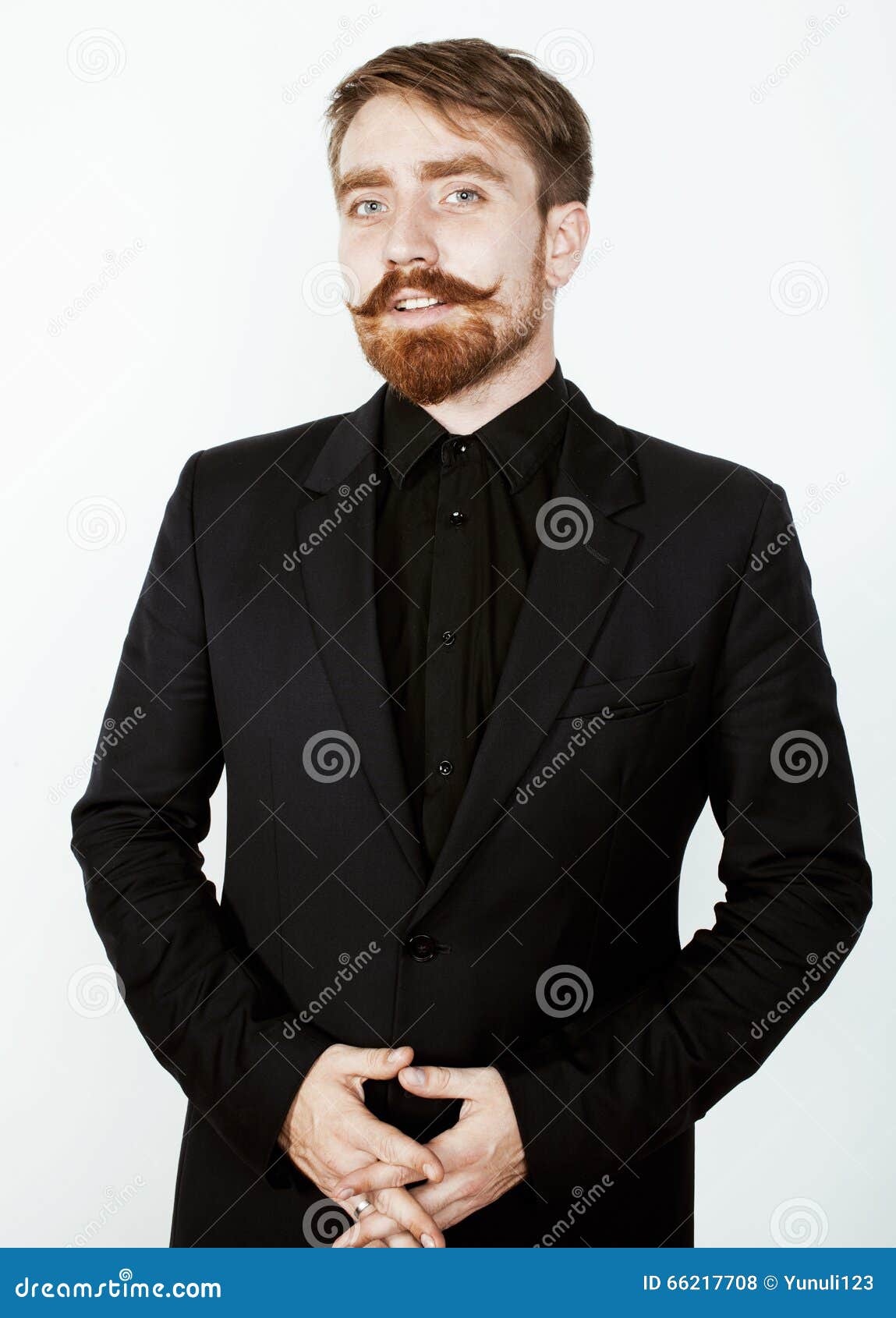 Young Red Hair Man With Beard And Mustache In Black Suit On