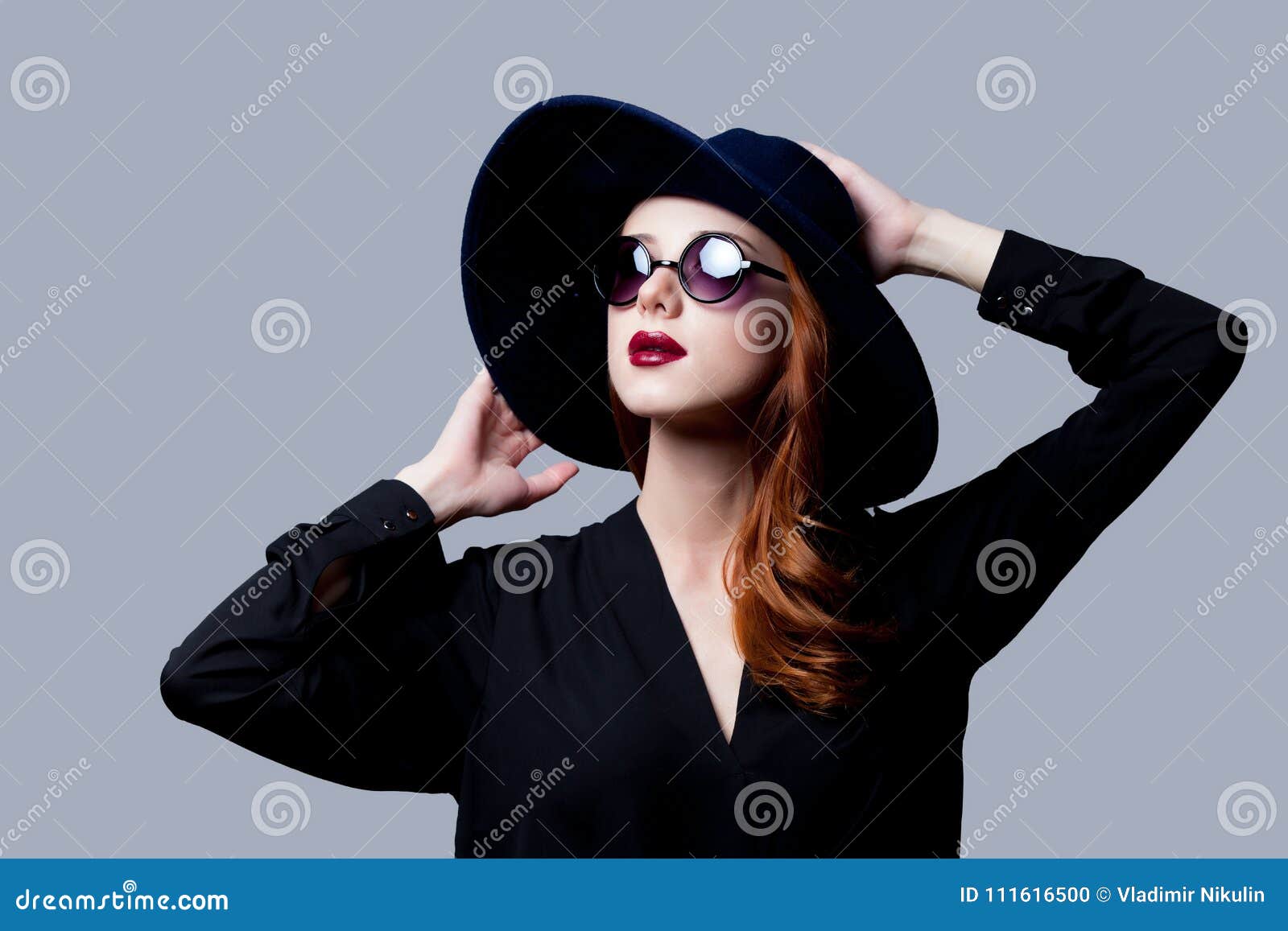 Young Redhead Girl in Dark Style in Sunglasses Stock Photo - Image of ...