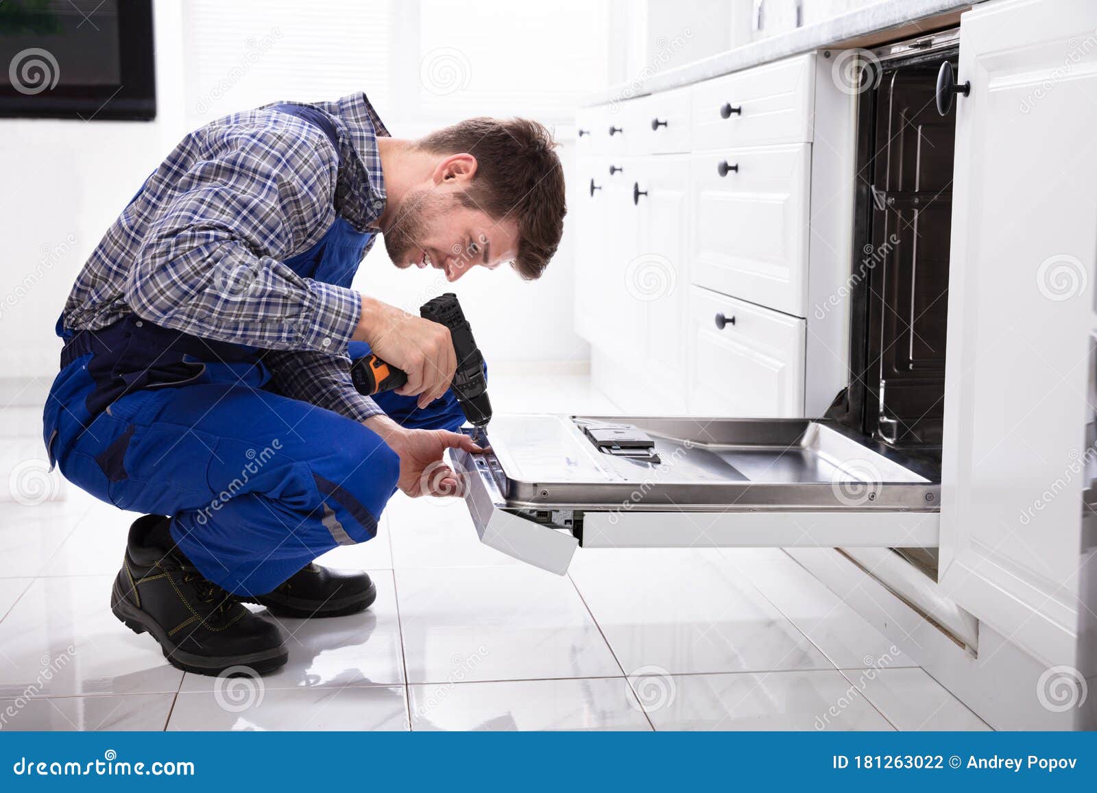 Repairman Fixing Dishwasher Stock Photo Image of electrician, service