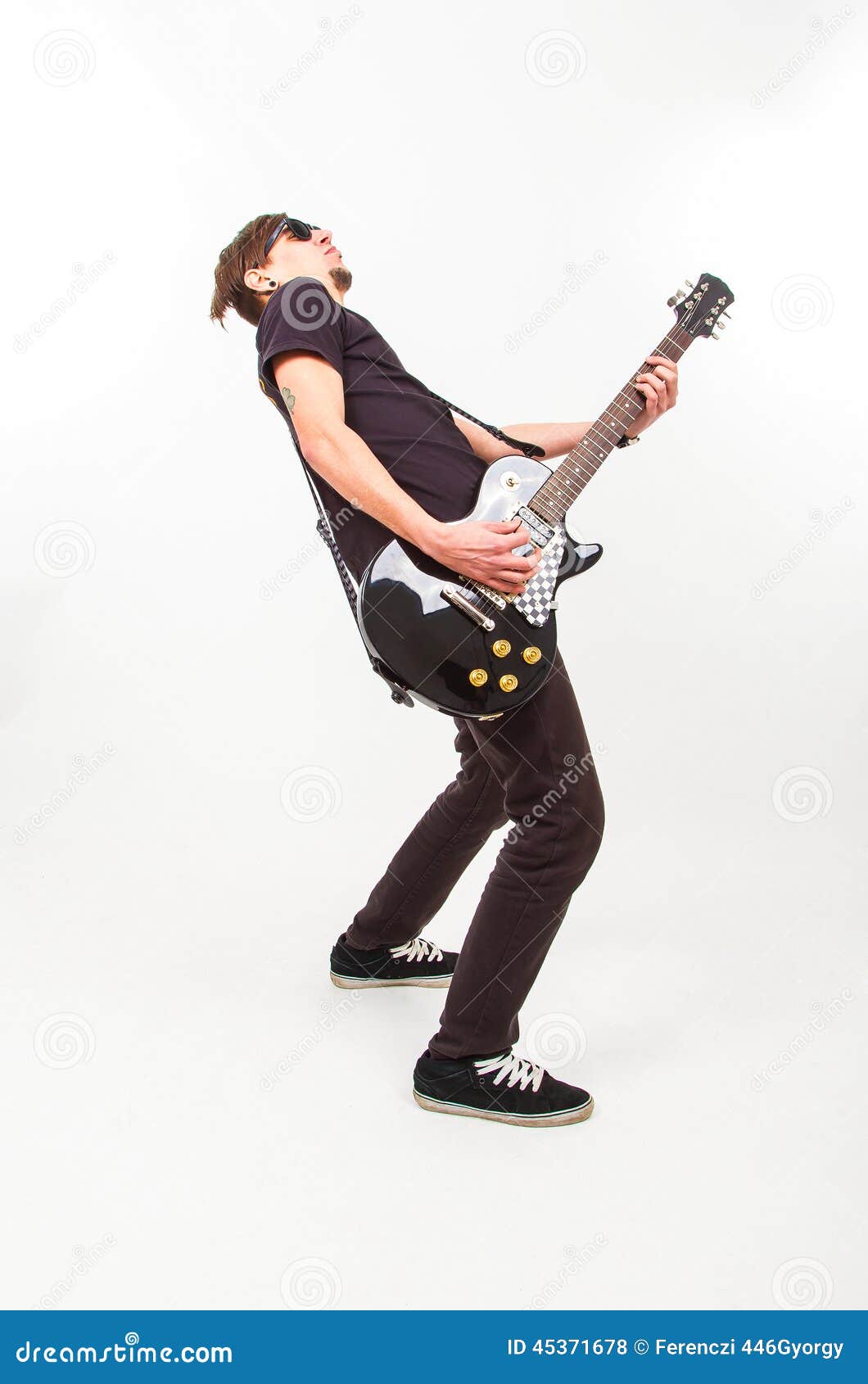 Young Rockstar Playing on Guitar Stock Photo Image of rocker