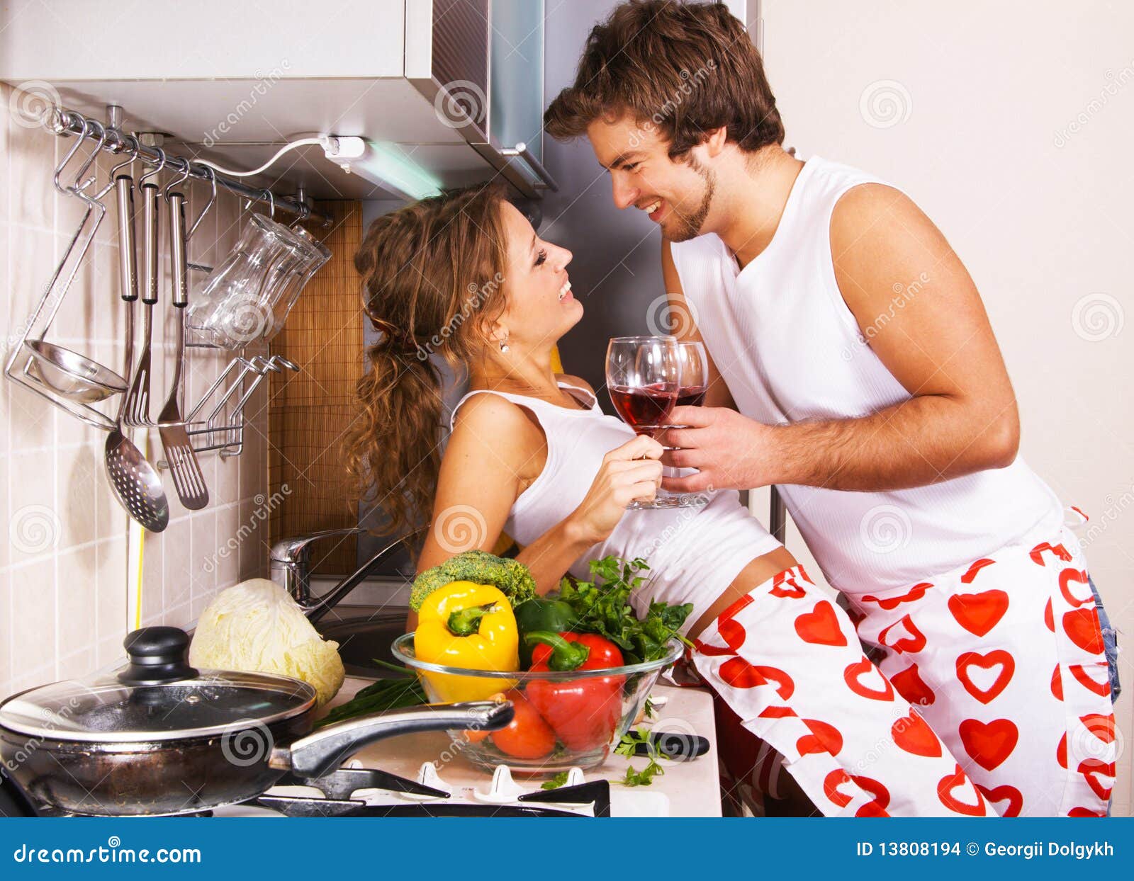 Young Romantic Couple in the Kitchen Stock Photo Image of legs, house